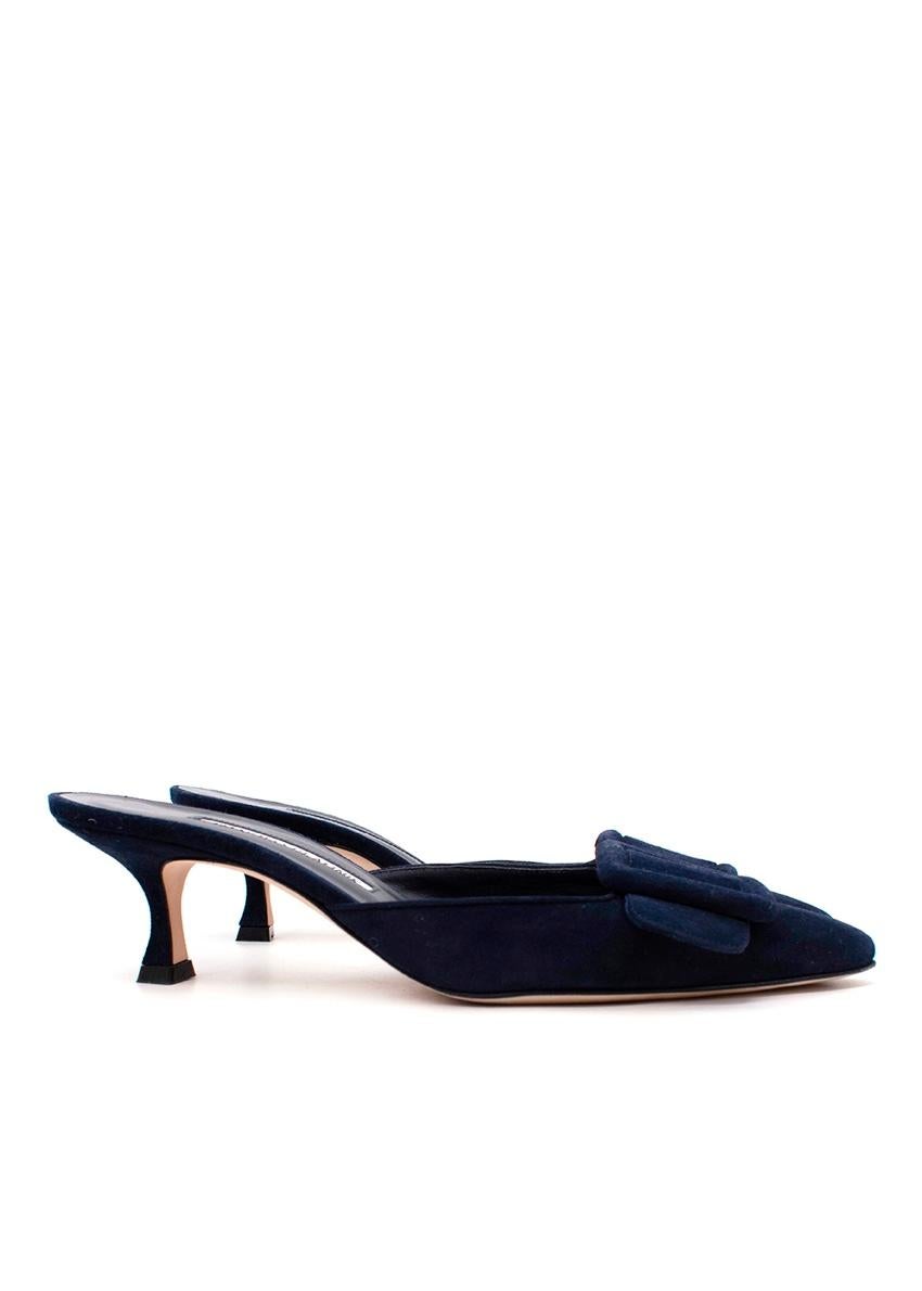Manolo Blahnik Navy Suede Maysale 50 Heeled Mules
 
 
 
 - Deep navy suede upper with tonal buckle detail
 
 - Point toe
 
 - Backless
 
 - Set on a mid-height stiletto heel
 
 
 
 Materials: 100% Leather
 
 
 
 Made in Italy
 
 
 
 PLEASE NOTE,