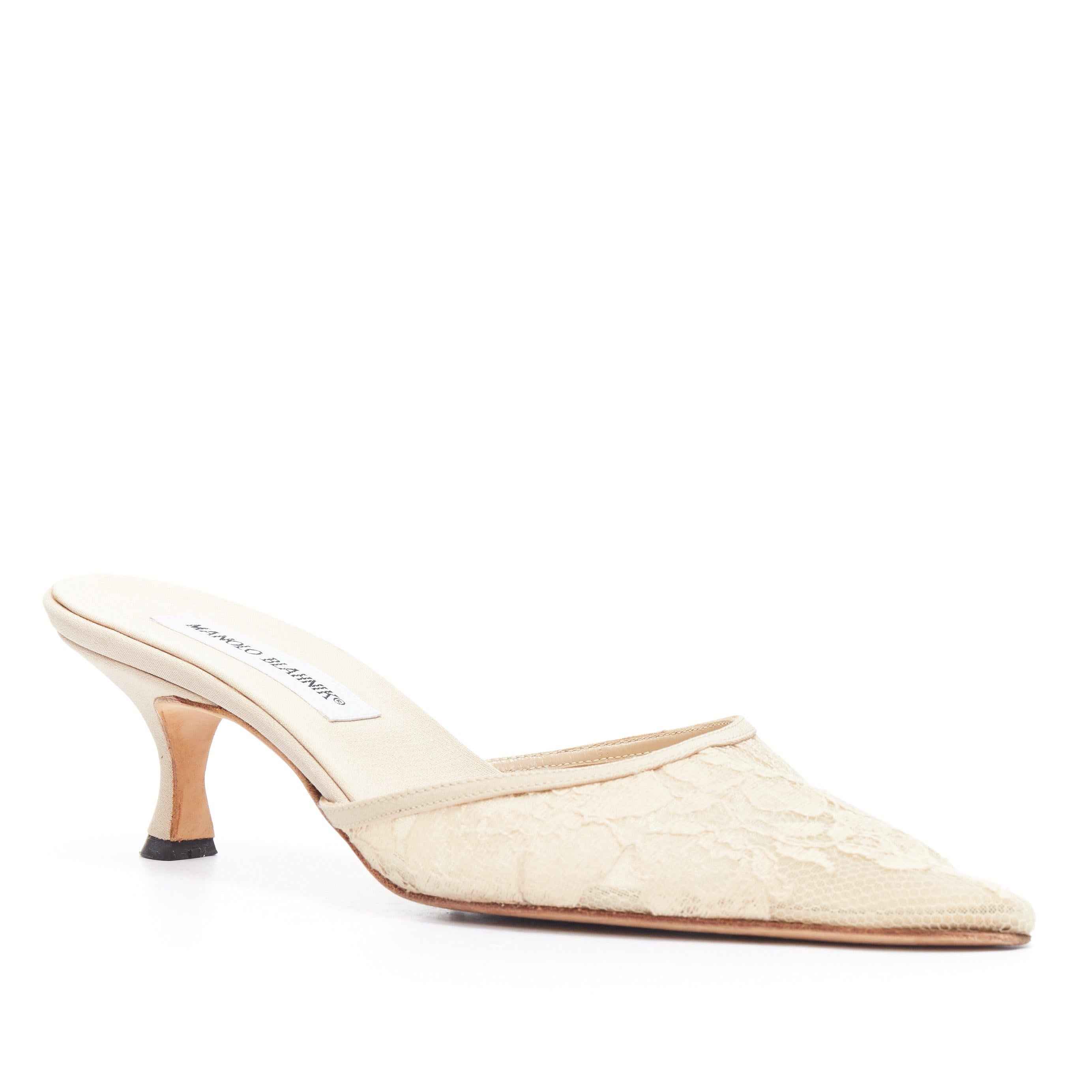 MANOLO BLAHNIK nude beige floral lace applique mesh pointy mid heel mule EU38
Reference: CC/ASCW00270
Brand: Manolo Blahnik
Material: Fabric
Color: Beige
Pattern: Solid
Lining: Leather
Extra Details: Floral lace applique on mesh. Pointed toe. Mid