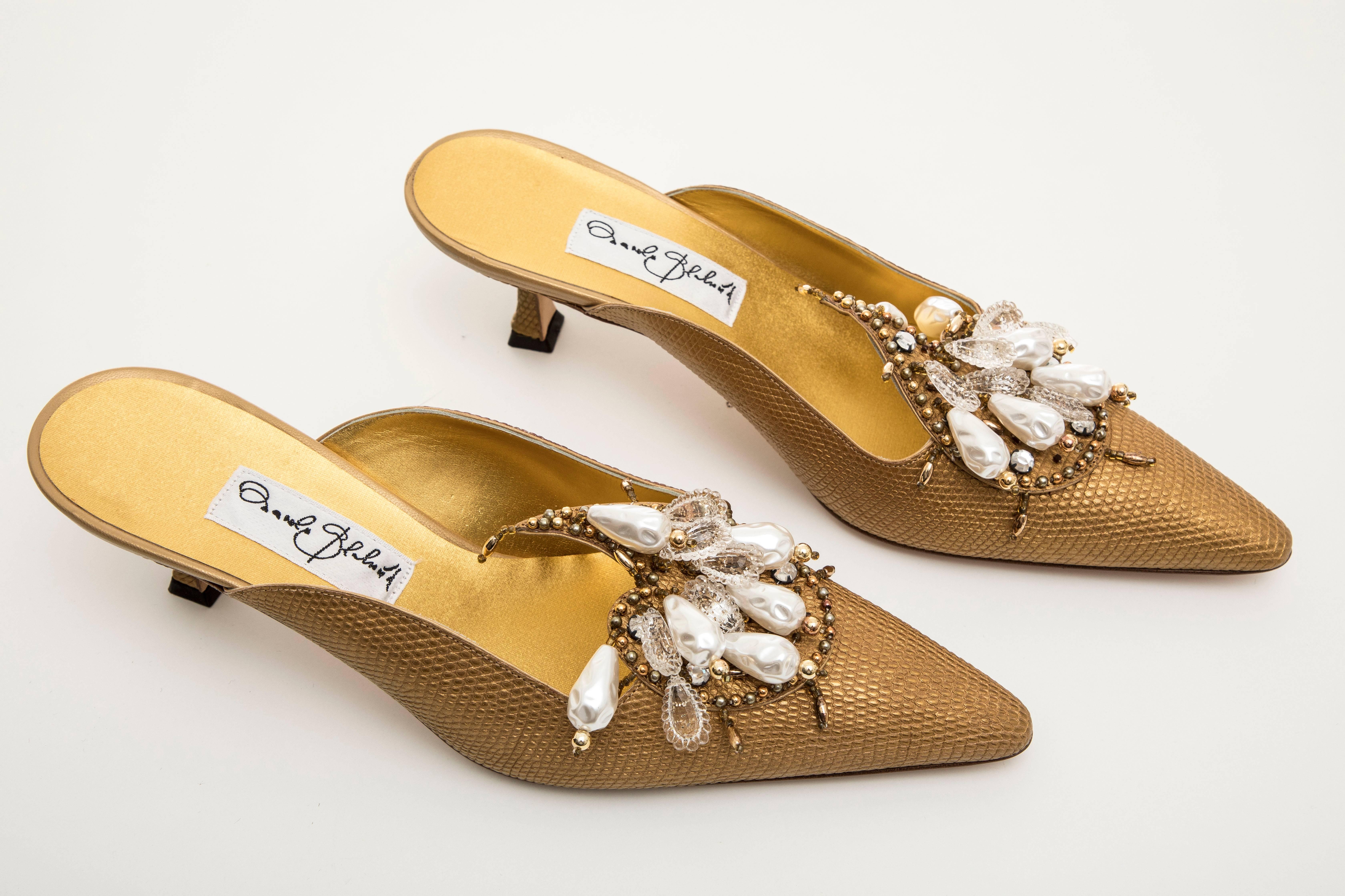 manolo blahnik gold mules