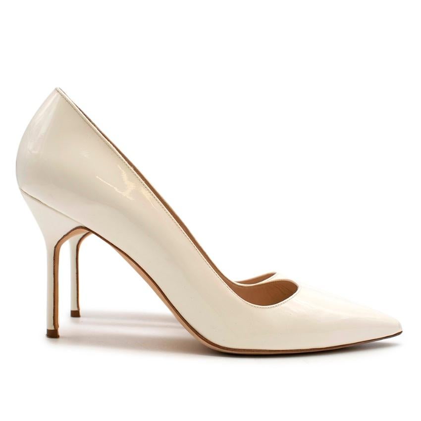 Manolo Blahnik Patent Leather Cream Pointed Toe Pumps 

- Pointed toe 
- Slip on 
- 9.5cm heel 
- no platform 
- Patent Leather Outer 
- Soft Leather insole 
- light tan insole with branding 

Made in Italy 

Please note, these items are pre-owned