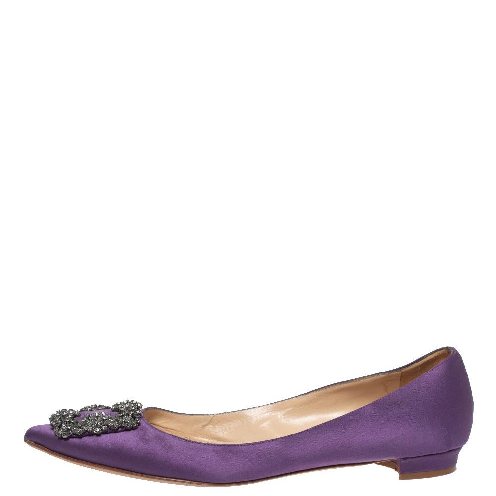 You know you are going to have a glamorous day the moment you put these ballet flats on. They are a Manolo Blahnik creation, meticulously crafted from satin and lined with leather on the insoles. The pair carries a purple hue and the iconic Hangisi