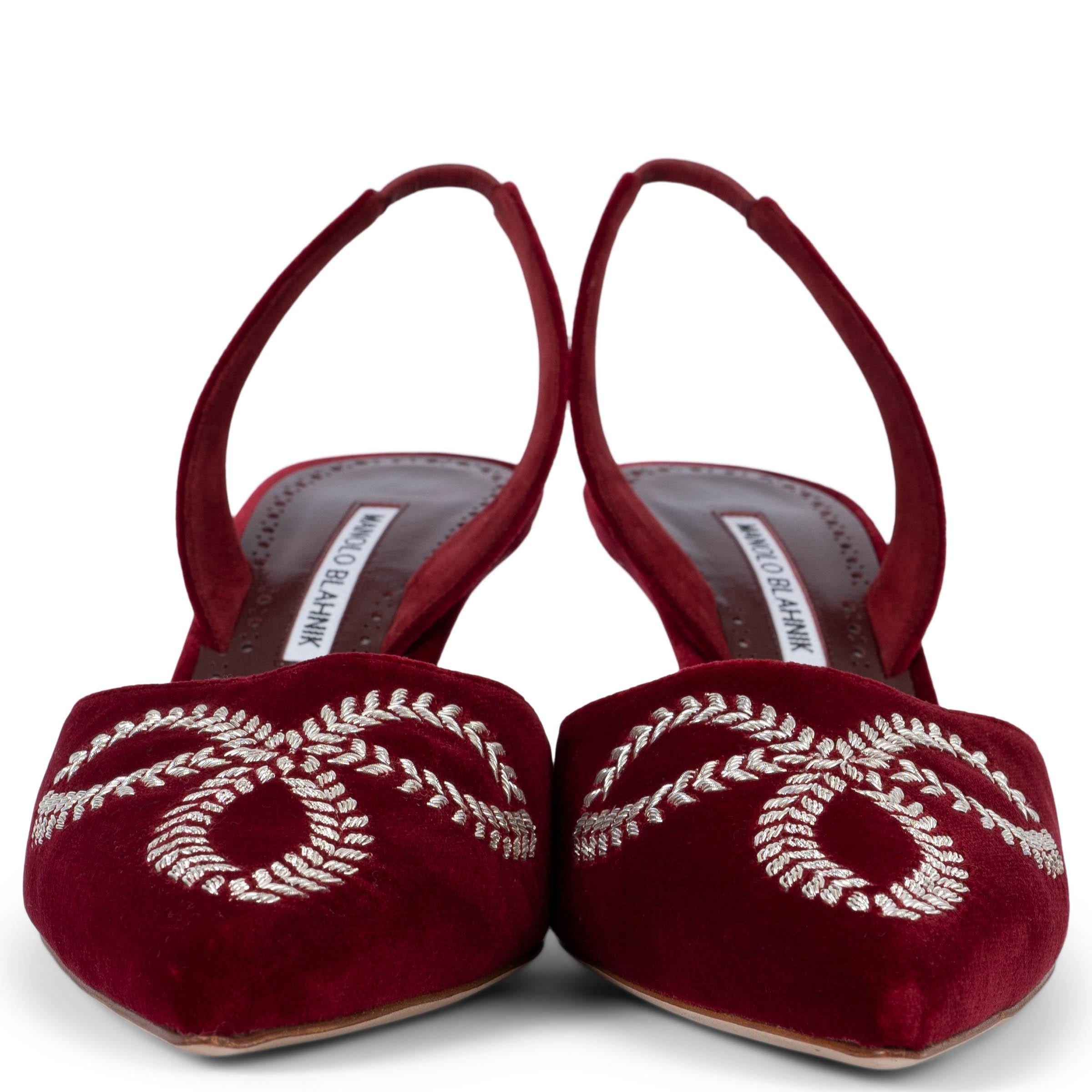 100% authentic Manolo Blahnik Doyasi 70 slingbacks in burgundy velvet decorated with silver-tone lurex embroidery. Brand new. 

Measurements
Imprinted Size	41.5
Shoe Size	41.5
Inside Sole	28.5cm (11.1in)
Width	8cm (3.1in)
Heel	7cm (2.7in)

All our