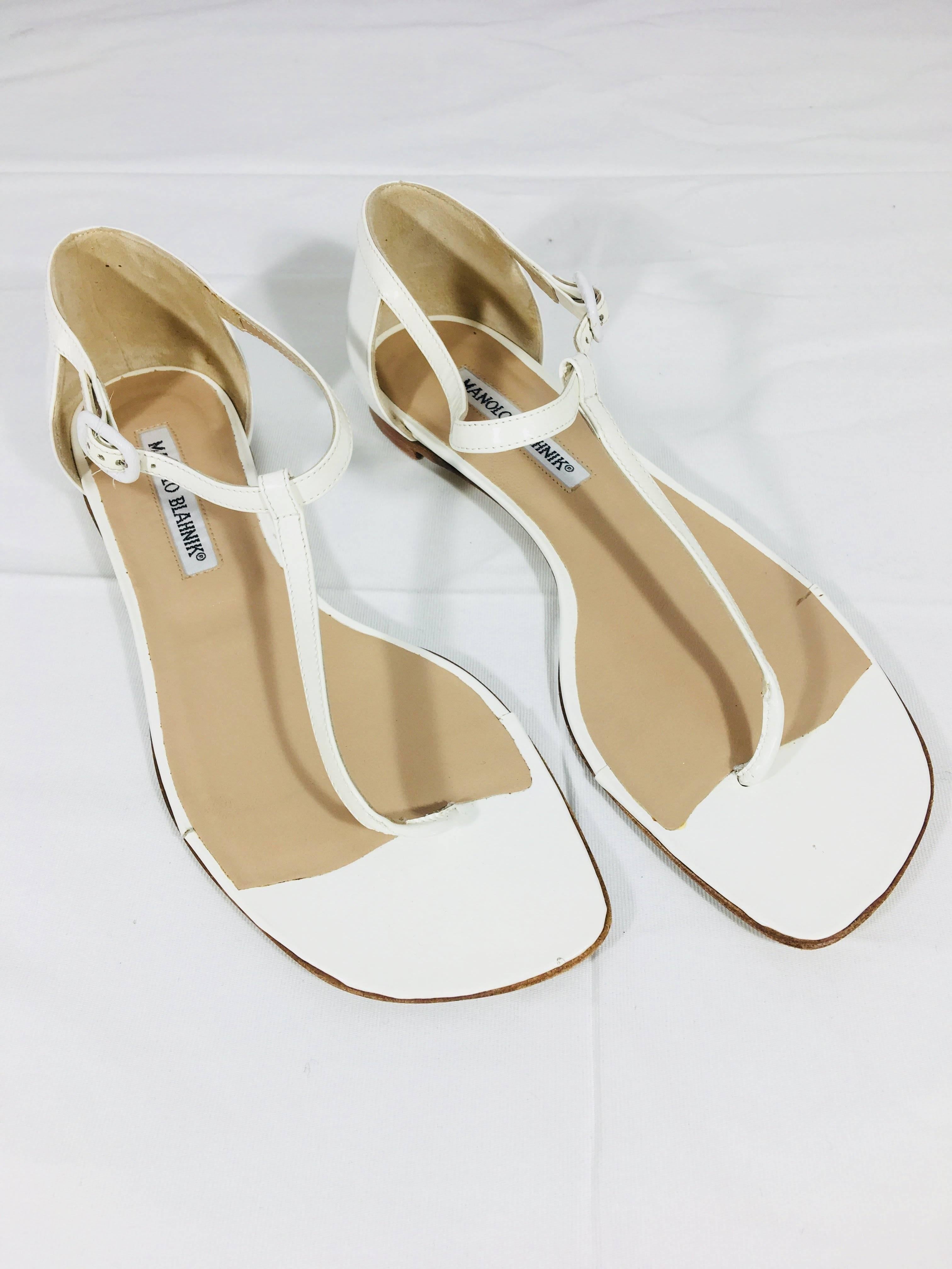 Manolo Blahnik White Patent Leather Thong Sandals with Ankle Strap.