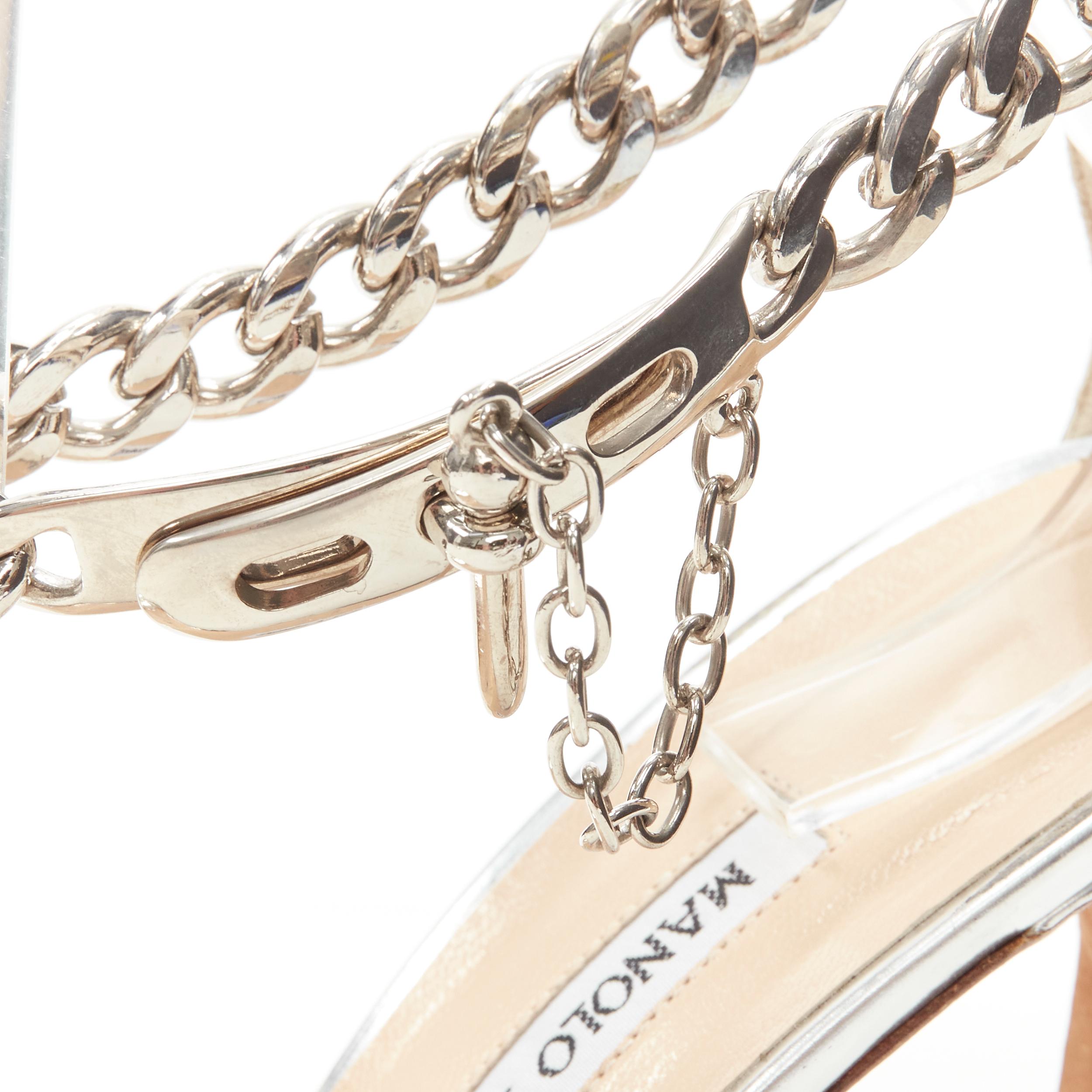 MANOLO BLAHNIK silver chunky chain lock ankle strap high heel sandal EU37 US7 
Reference: LNKO/A01991 
Brand: Manolo Blahnik 
Material: Leather 
Color: Silver 
Pattern: Solid 
Extra Detail: Metal chain ankle strap with T-lock detailing. 
Made in: