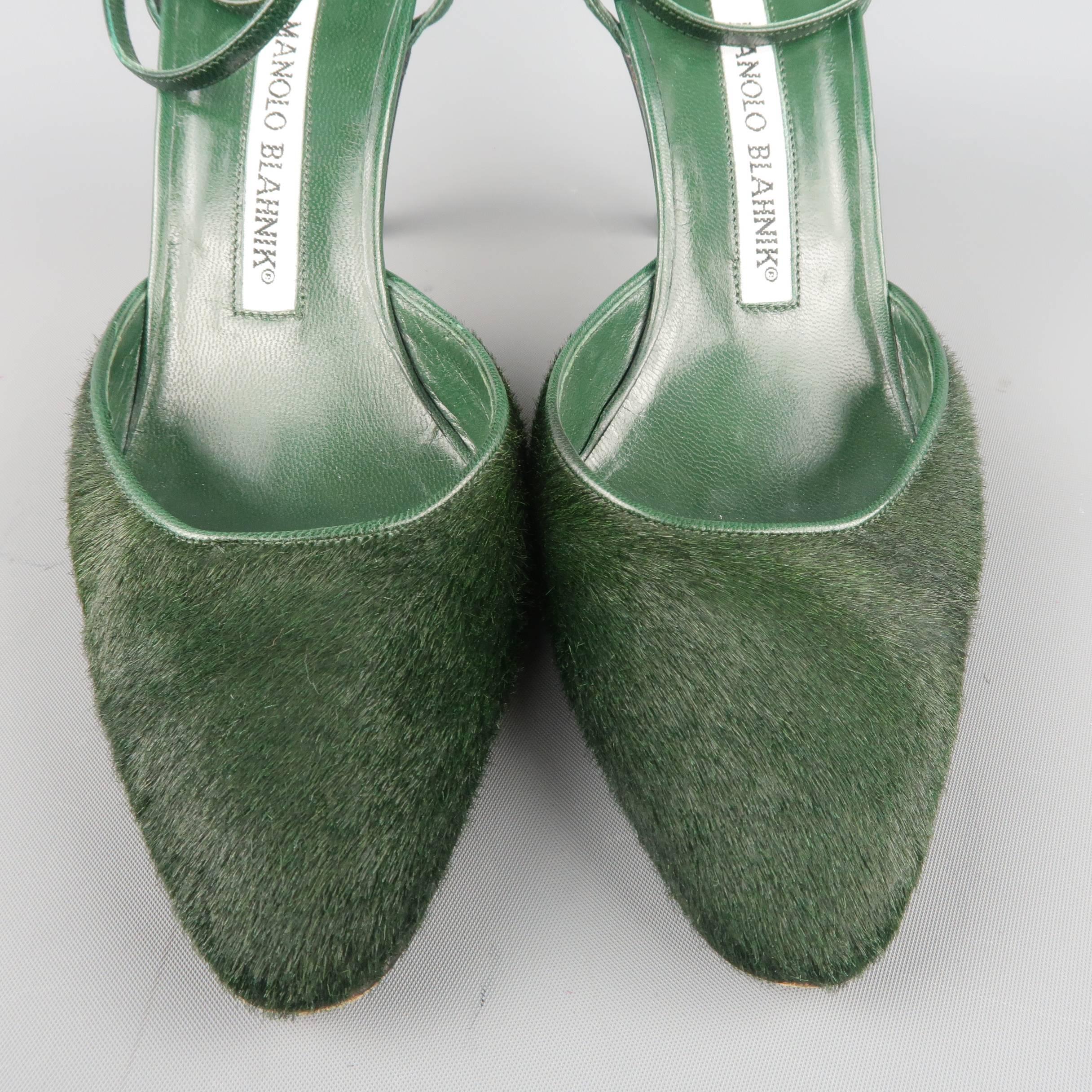 MANOLO BLAHNIK pumps come in green leather with a pointed, ponyhair toe, covered stiletto heel, and wrap ankle strap. Made in Italy.
 
Good Pre-Owned Condition.
Marked: IT 35.5
 
Measurements:
 
Heel: 3.5 in.