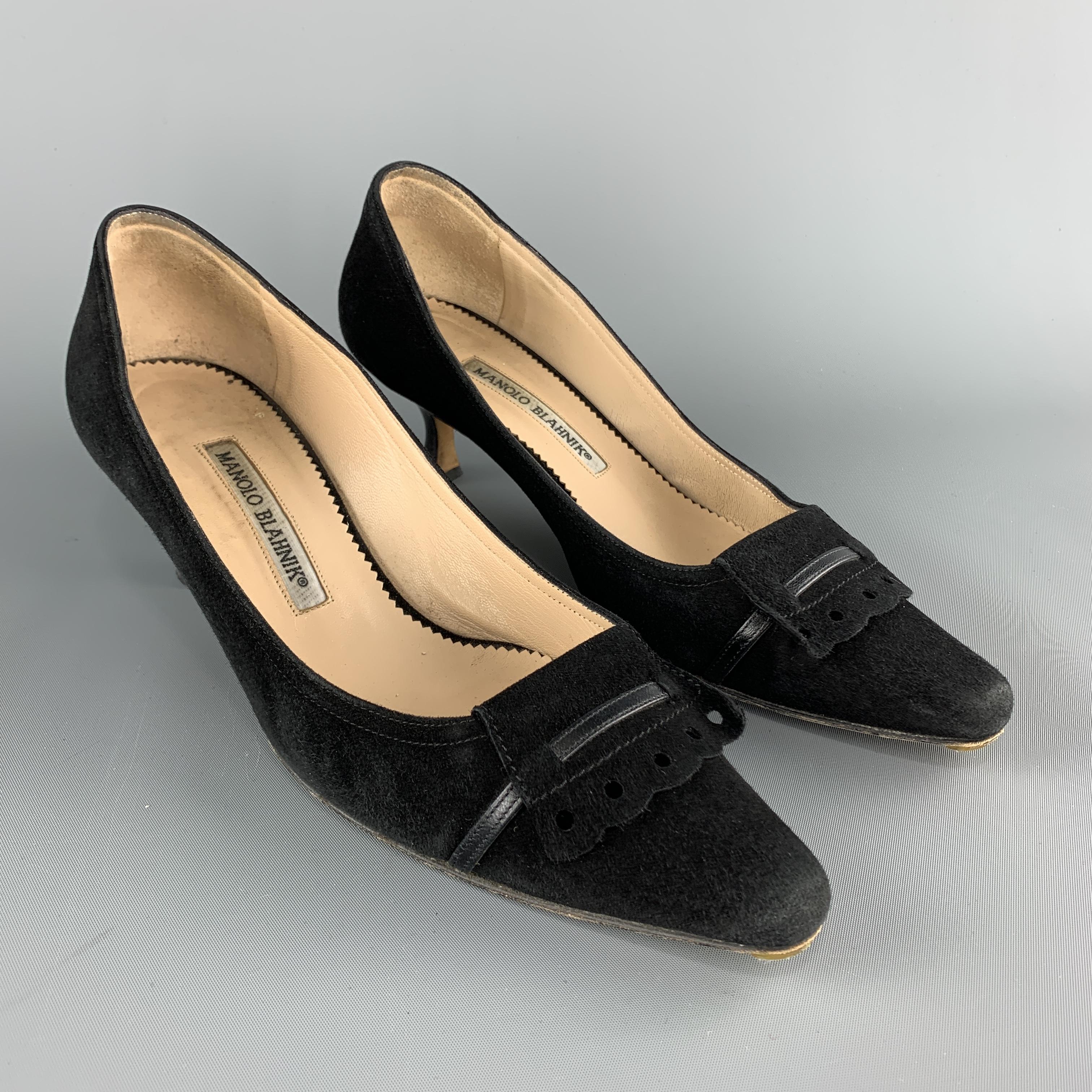 MANOLO BLAHNIK kitten pumps come in black suede with a pointed toe accented by a perforated ruffle and leather woven strap. Made in Italy.

Very Good Pre-Owned Condition.
Marked: IT 37

Heel: 2.25 in. 