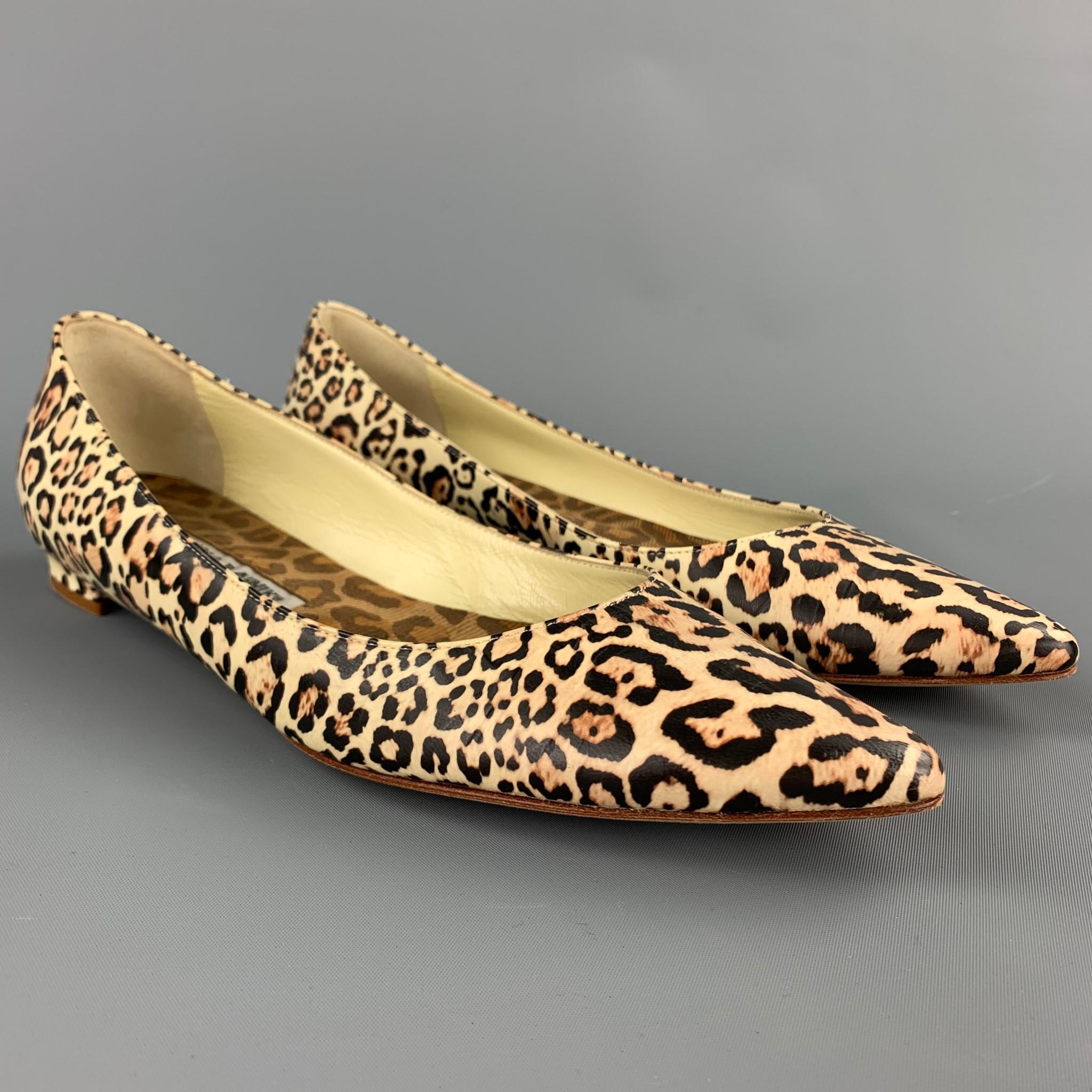 MANOLO BLAHNIK flats comes in a beige animal print leather featuring a pointed toe and a rubber heel. Made in Italy.

Good Pre-Owned Condition.
Marked: EU 38.5

Outsole: 

10.5 in. x 3 in. 
