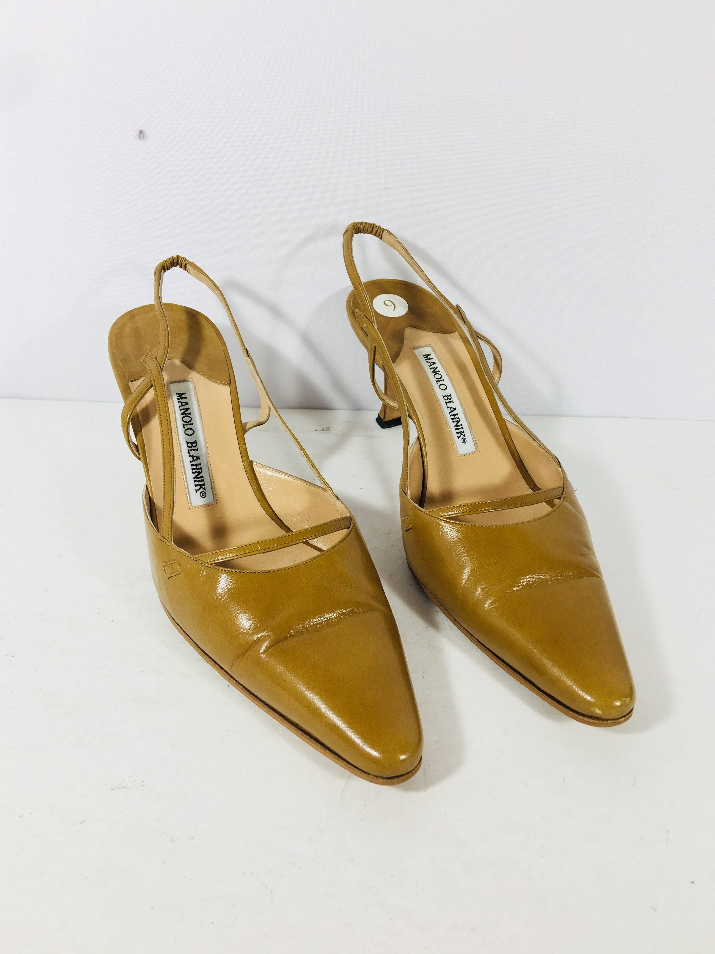 Manolo Blahnik Sling backs with Pointed Toe in Nude Leather. 