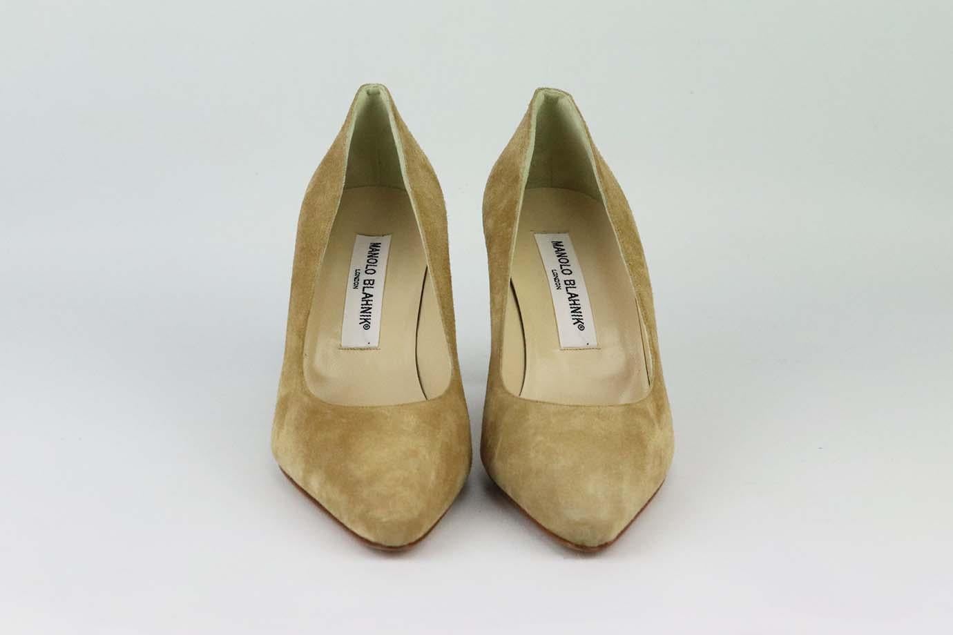 These pumps by Manolo Blahnik are a classic style that will never date, made in Italy from supple beige suede, they have pointed toes and comfortable 63 mm heels to take you from morning meetings to dinner with friends. Heel measures approximately