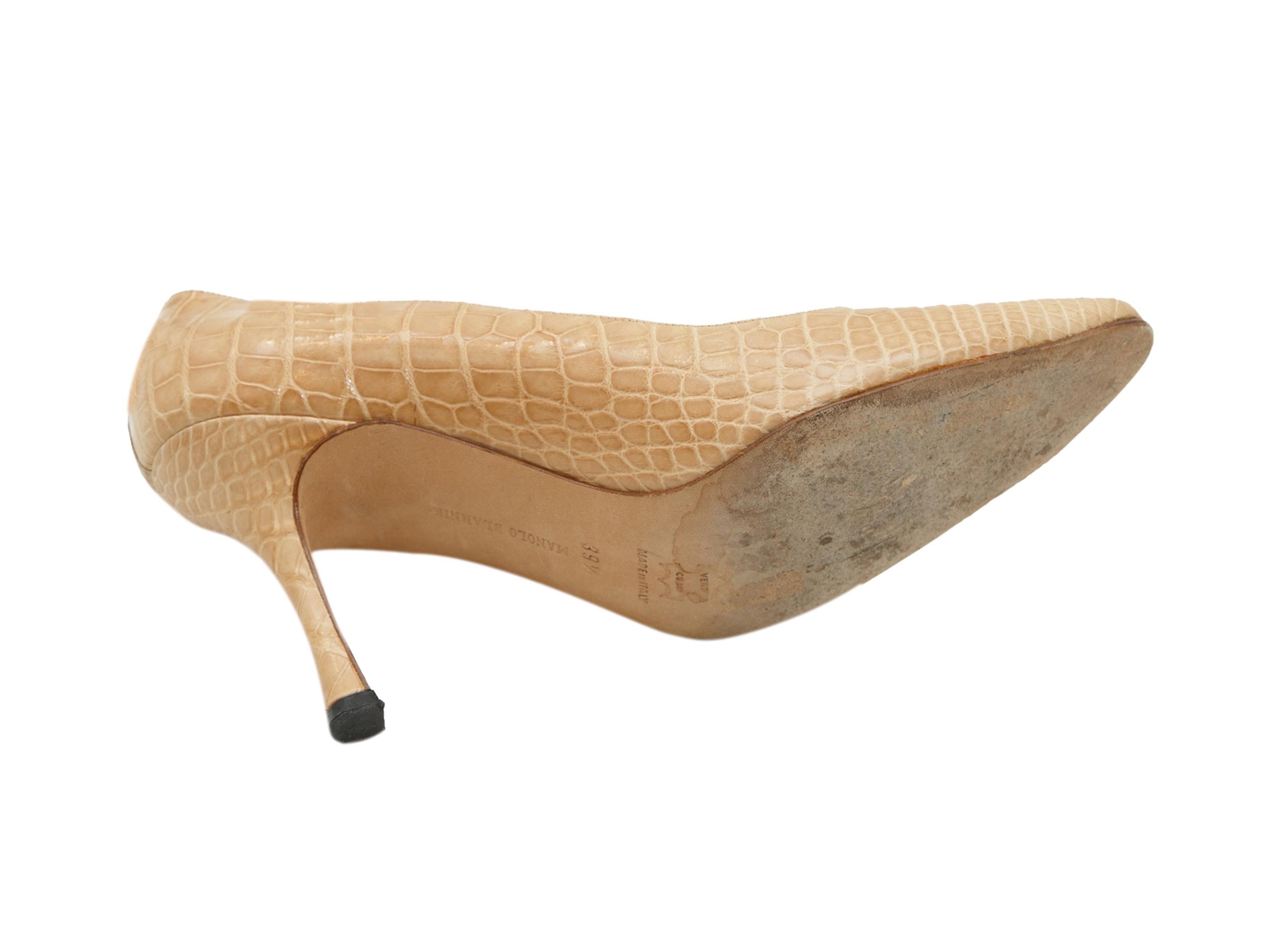 Product details: Tan alligator pumps by Manolo Blahnik. Slip-on style. Semi-pointed toes. Covered heels. Designer size IT39.5. 4
