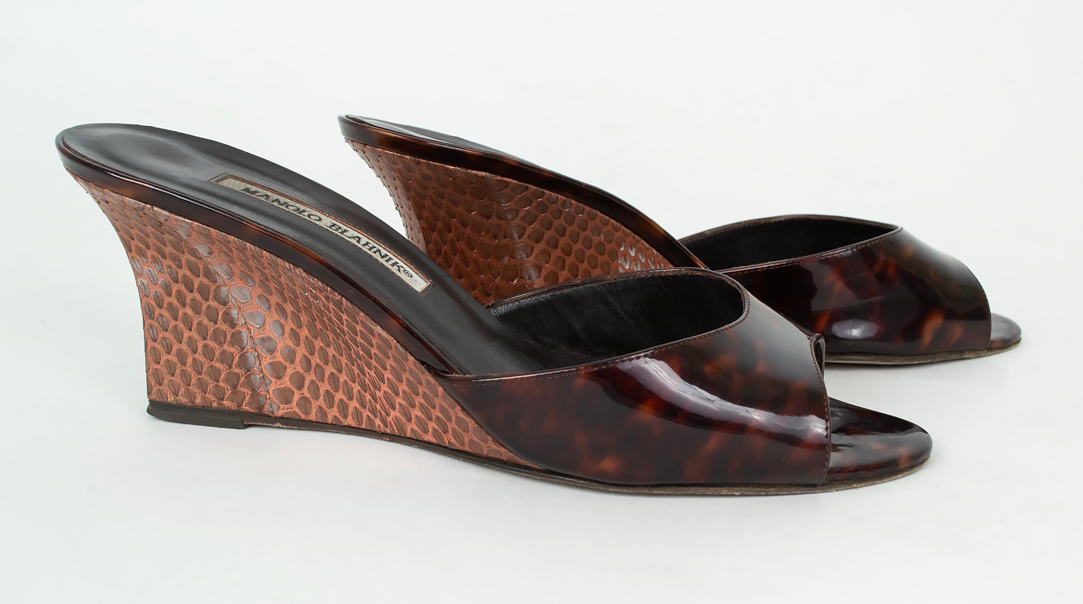 Like a pair of tortoiseshell sunglasses for your feet. Timeless, elegant and understated whether by the pool or on the boulevard.

Peep toe mule sandals with tortoise patent leather upper and bronze snakeskin covered wedge heel. Leather insole and