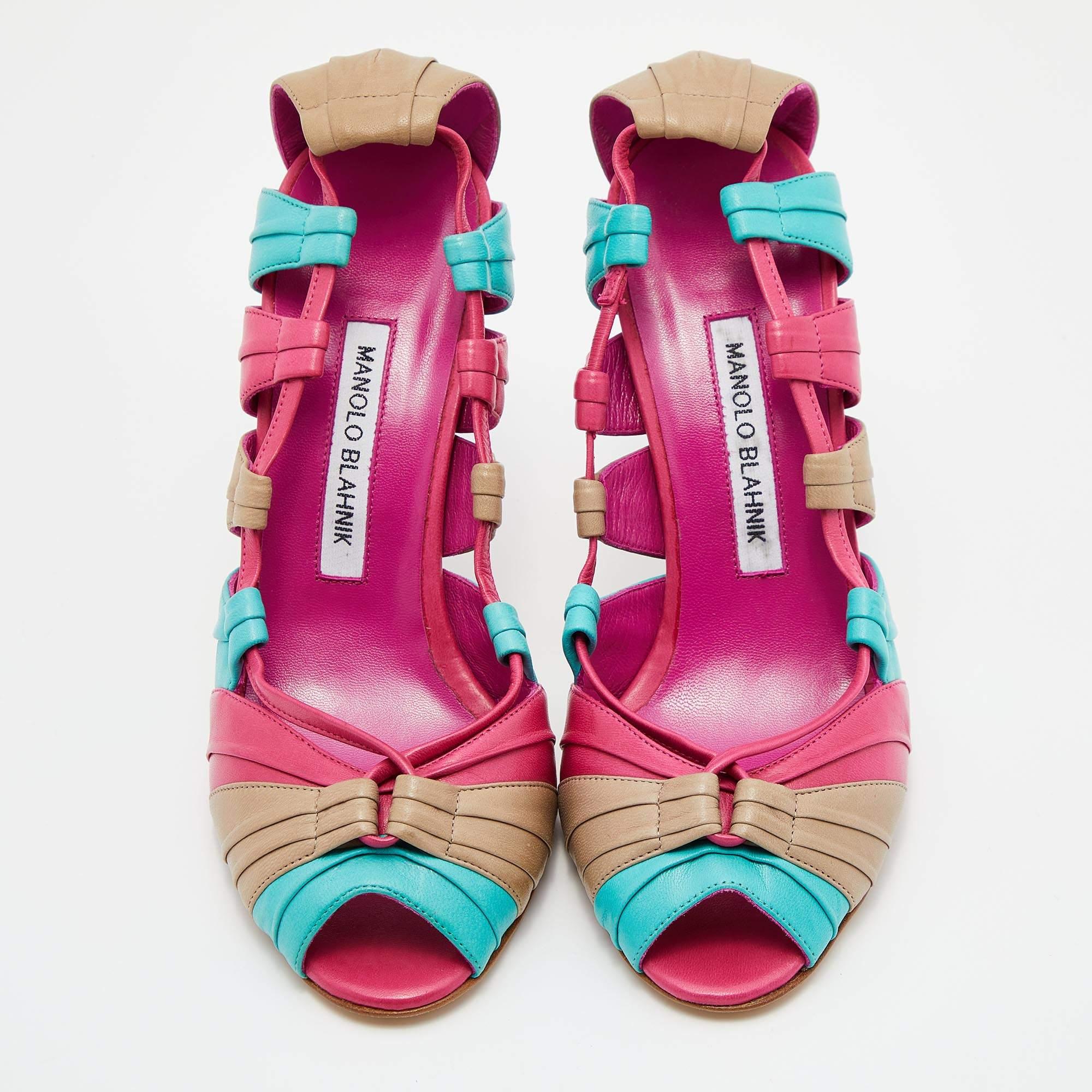 Deliver statement looks with these sandals from Manolo Blahnik! From their shape and detailing to their overall appeal, they exude elegance. The sandals feature peep toes, three delight hues, and stiletto heels..

