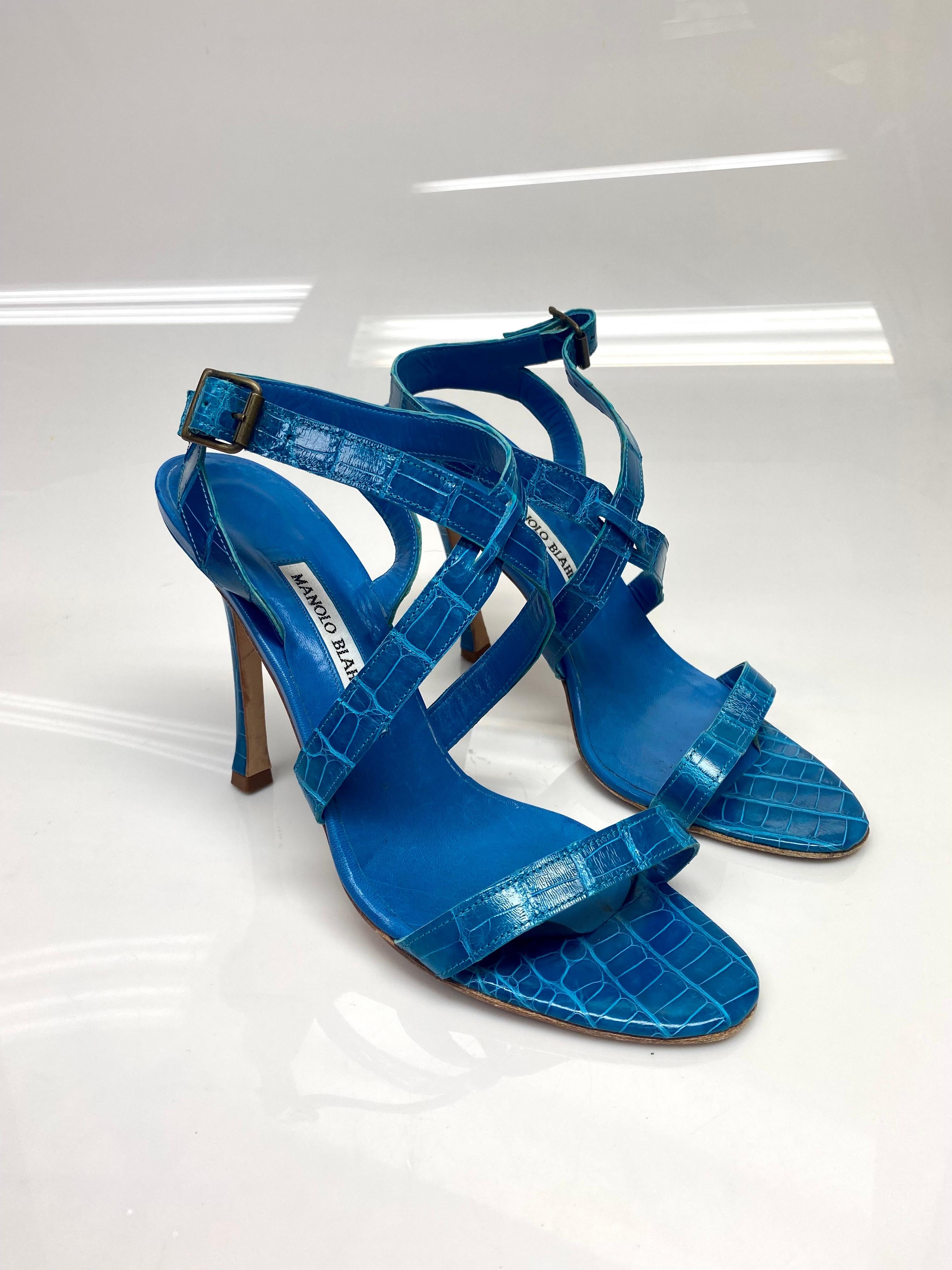 Manolo Blahnik Turquoise Crocodile Strappy Sandals - Size 39.5. A beautiful pair of Crocodile Manolo Blahnik shoes that are easy to wear and flaunt. These sandals are highly versatile. Constructed from top quality crocodile these are the perfect pop