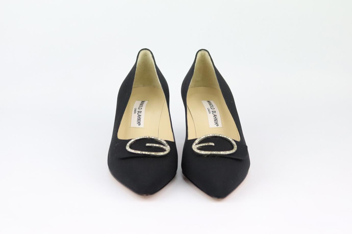 These pumps by Manolo Blahnik are a classic style that will never date, made in Italy from textured black grosgrain, they have pointed toes, embellished buckle and comfortable 38 mm heels to take you from morning meetings to dinner with friends.