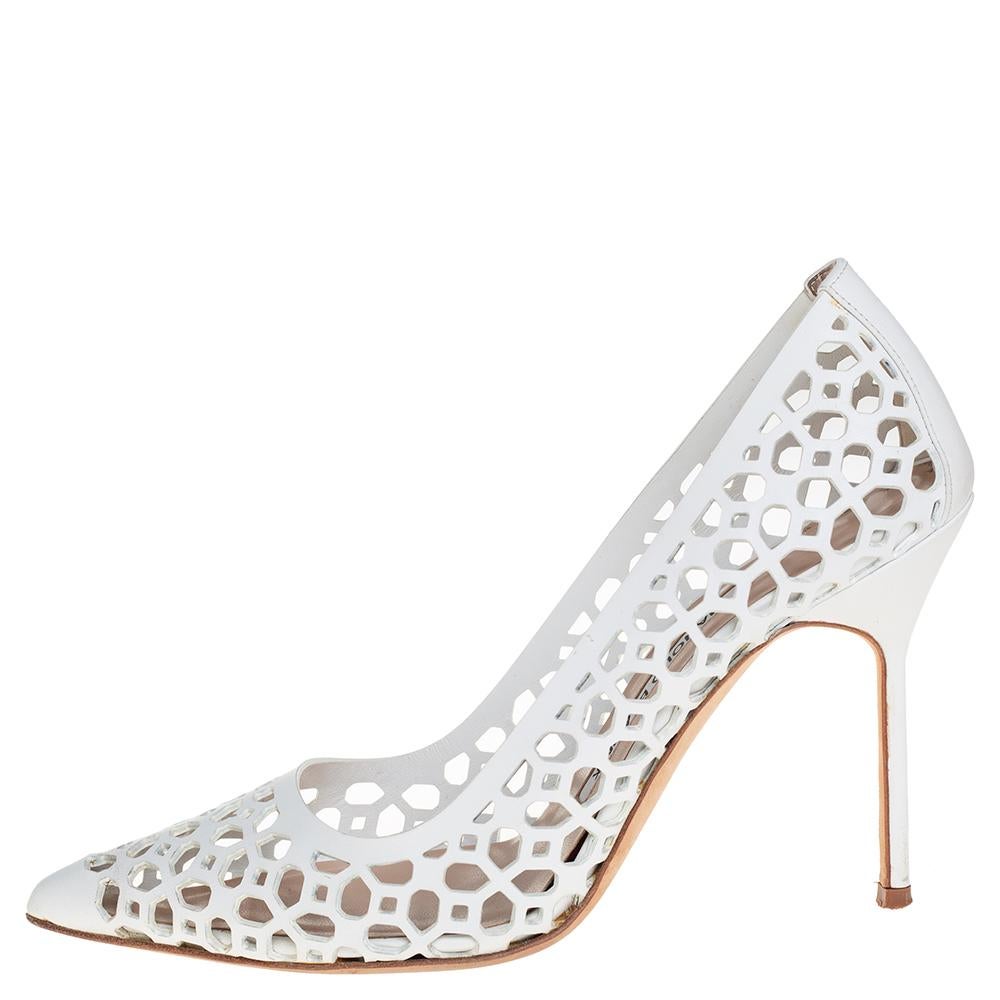 Chase your woes away by wearing this pair of magnificent pumps, that have been created from leather. They come in white with pointed toes, a laser-cut exterior, and 10 cm heels. You're sure to feel your best while walking in this pair of classy