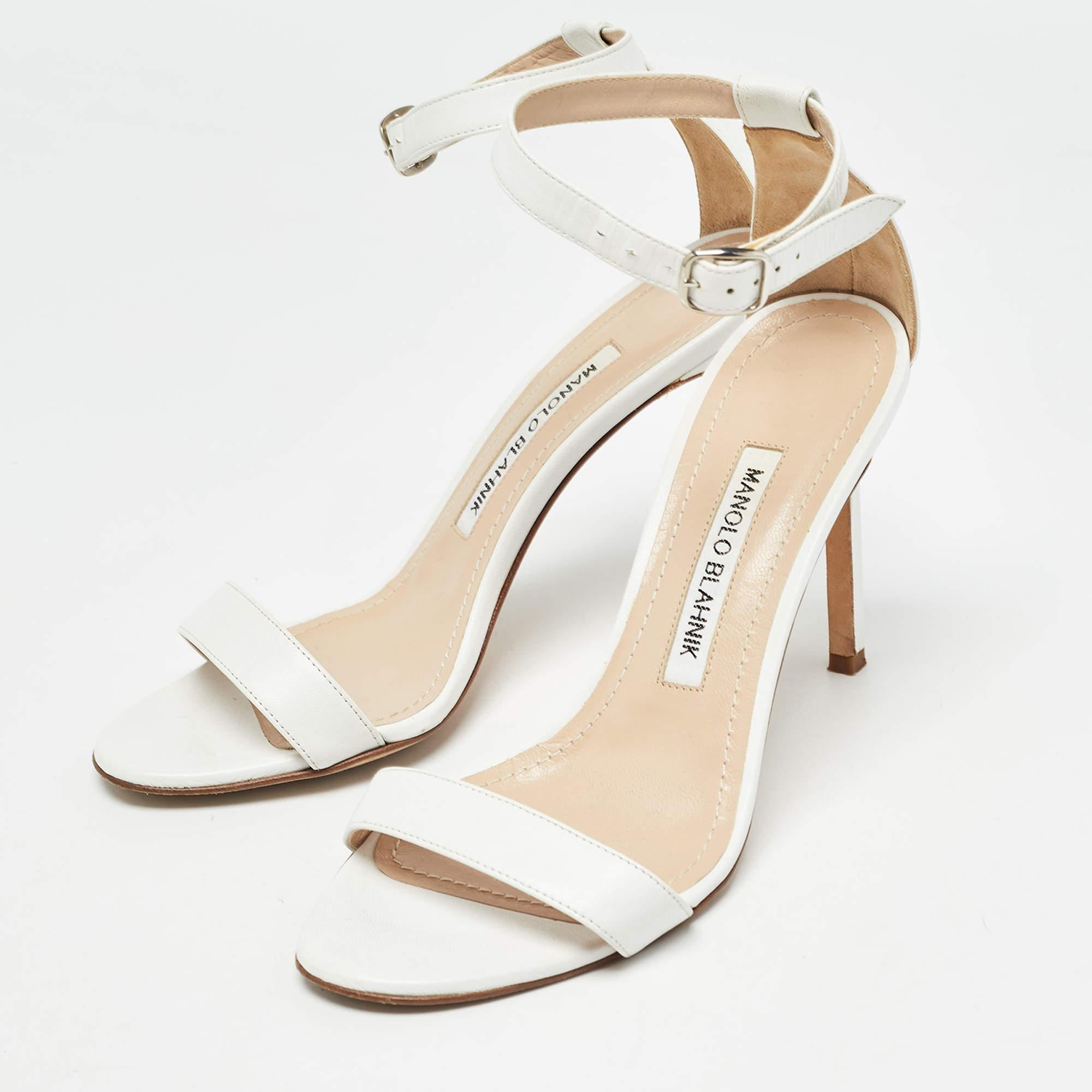 You can count on these Manolo Blahnik white sandals to complete a summer look. They are crafted beautifully and designed to offer the right fit and a comfortable lift.