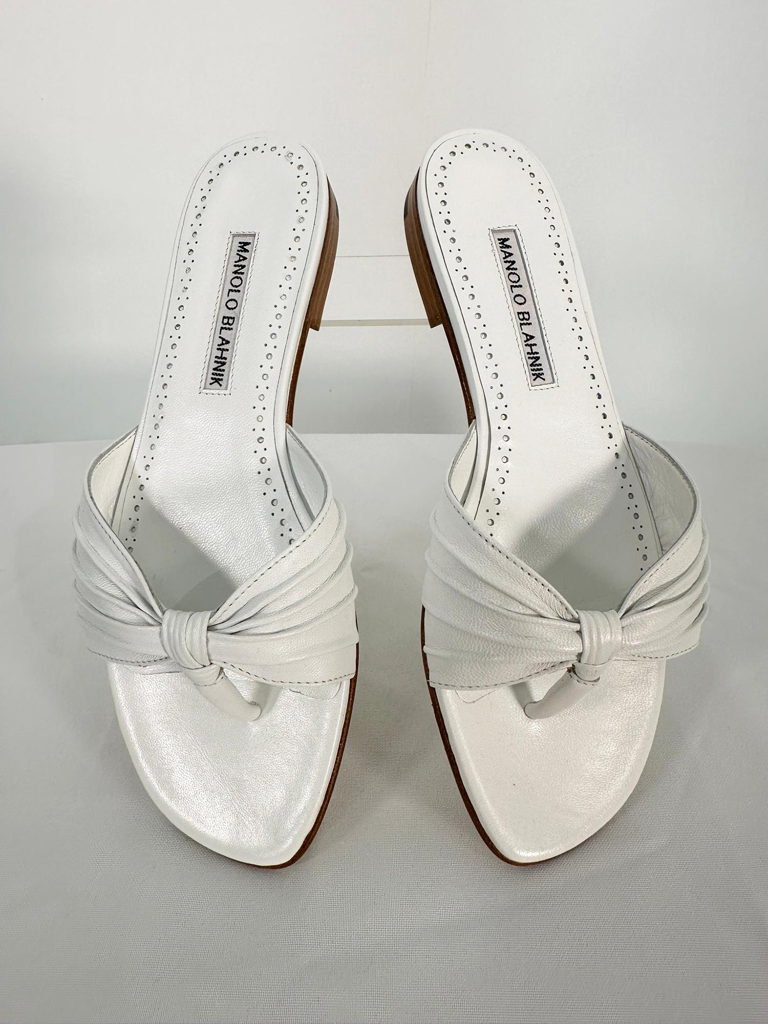 Manolo Blahnik,  Bernaperf, white nappa leather thong slide sandals. Unworn in the box with protector bags. 37. 