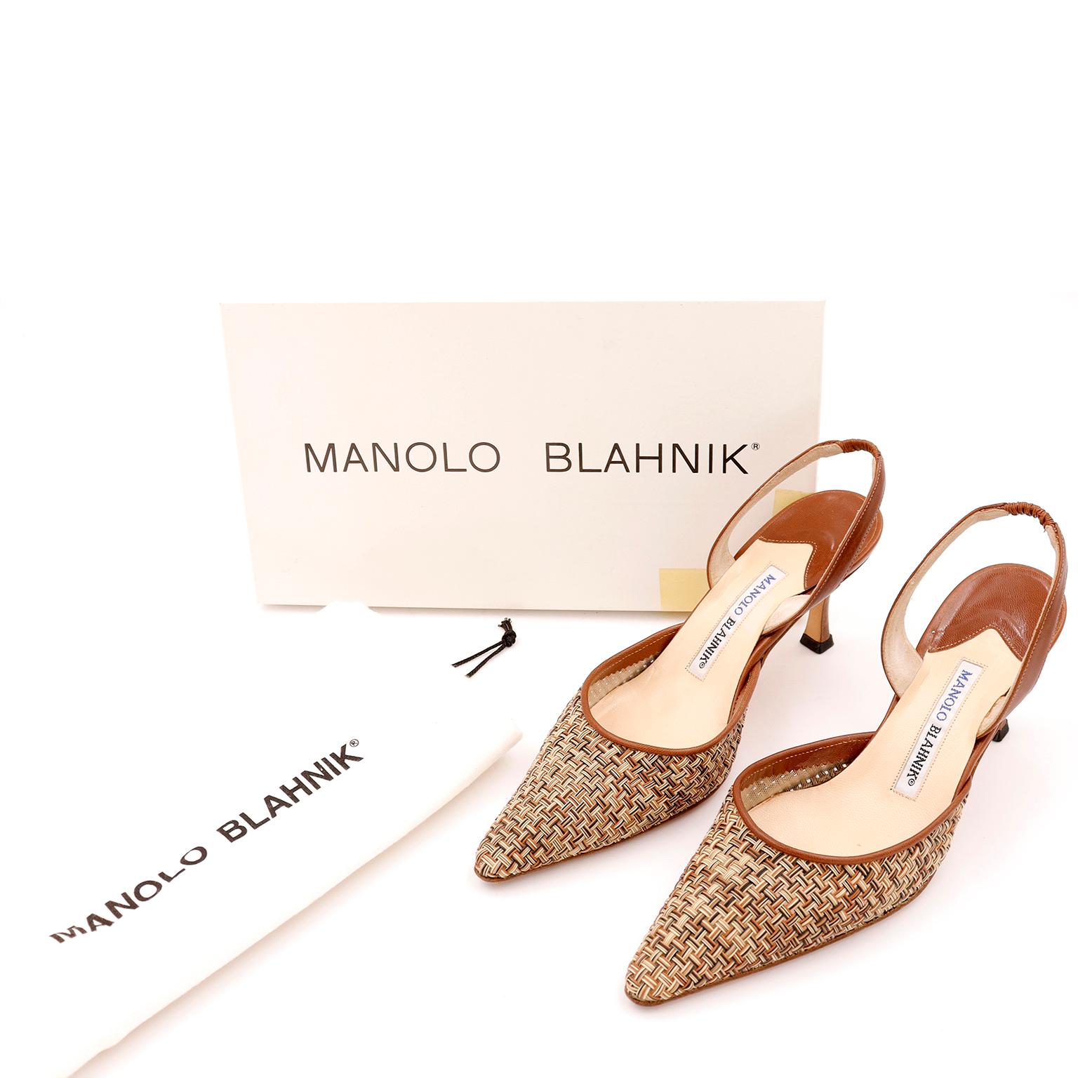 These are fabulous Manolo Blahnik leather woven Carolyne slingback shoes in multiple shades of brown. The classic Carolyne style is a fashion staple for stylish wardrobes. We love the mixed weave and the fun wood heel on these shoes! These are good