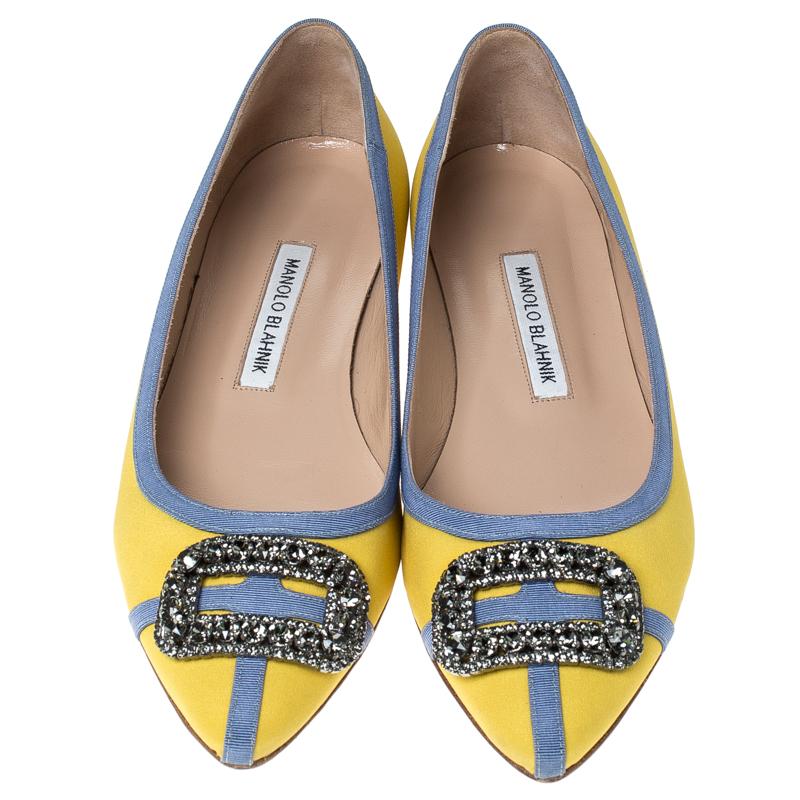 A classic pair of Manolo Blahniks is loved by women all over for its comfort and grace. These pretty shoes are constructed from yellow satin fabric and further made special with the brand's iconic buckle detail on the uppers.

Includes: Original