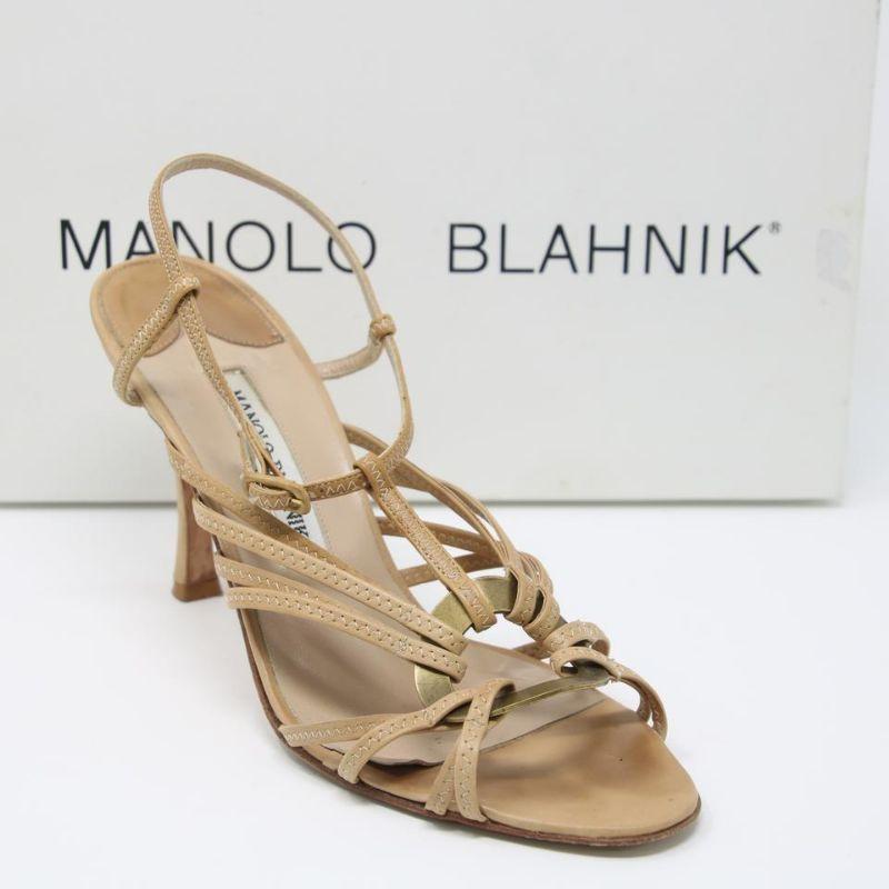 Manolo Blahnik Zig Zag Strappy Leather Open Toe Heel Sandals 37.5 MB-S0917P-0139

These chic and eye-catching Manolo Blahnik Tan Strappy Sandals are great for a night out or day time wear! These flattering shoes feature tan leather with zig-zag