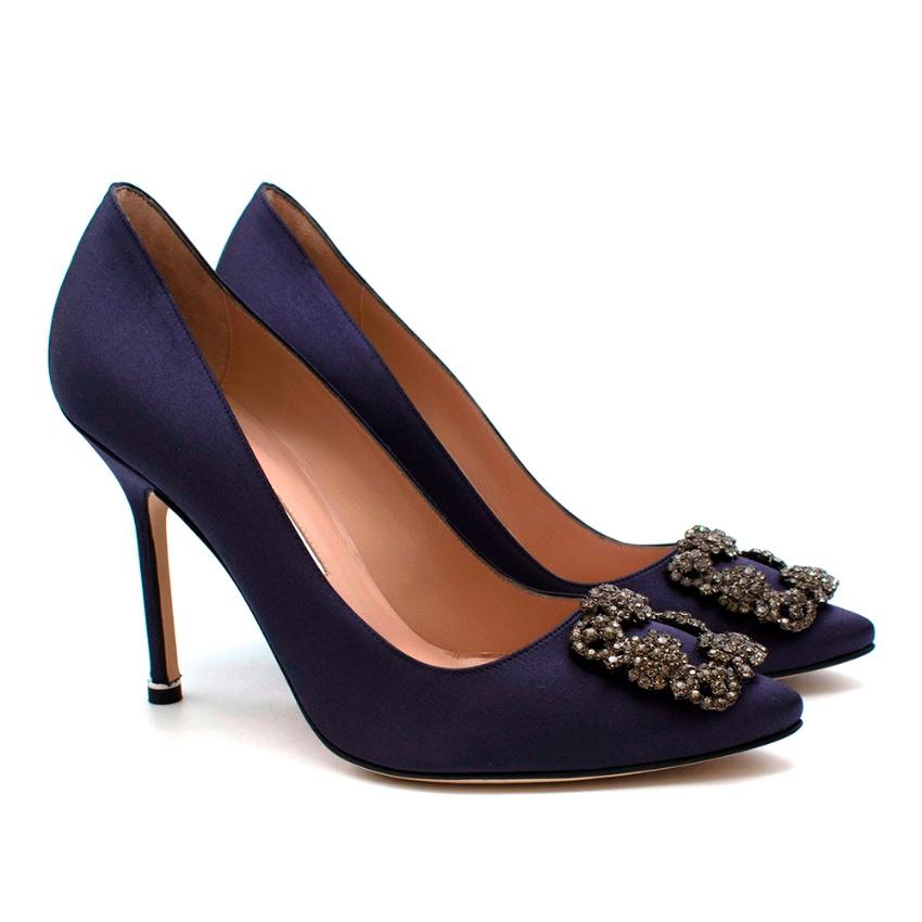 Manolo Blanhik Navy Hangisi Satin Jewel Buckle Pumps 

Navy blue satin almond toe pumps featuring a square crystal buckle and a stiletto mid heel

-One of the most iconic shoe designs 
-Super desirable 
-Elegant and timeless style 
-Original box and