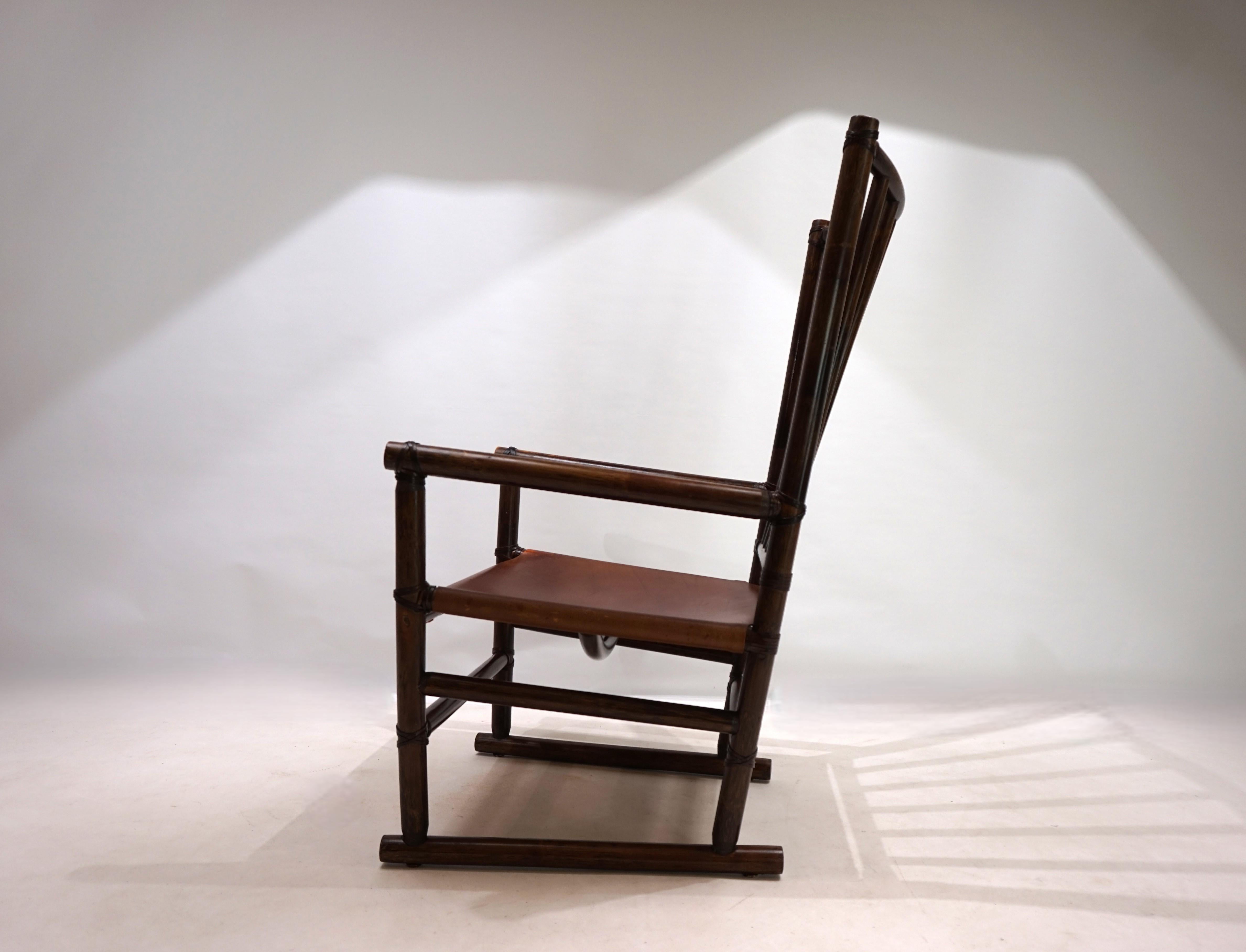Rotin Fauteuil Manou en rotin avec siège en cuir, 1960 en vente