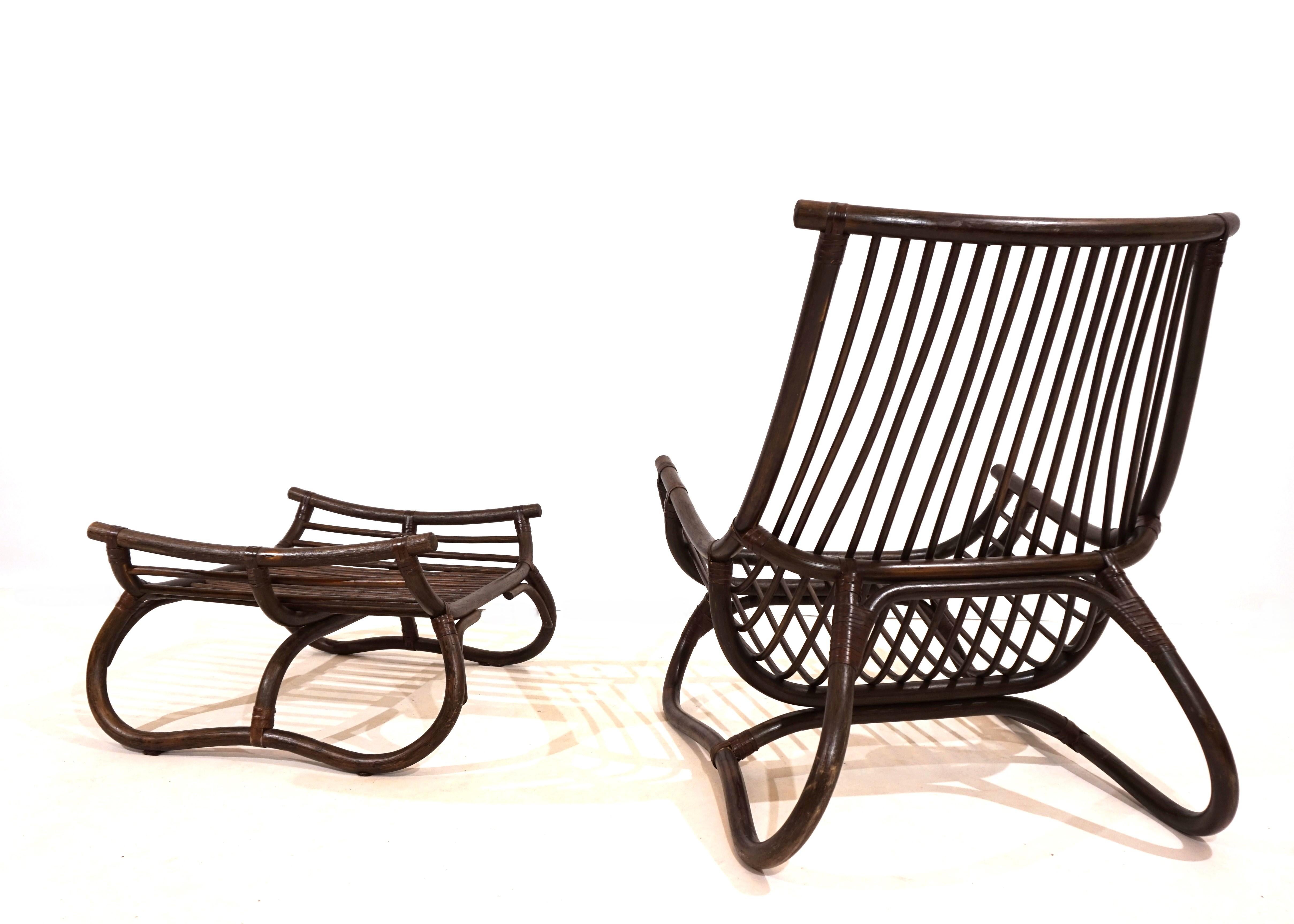 The lounge chair is made of Manou rattan and is in very good condition. The frame made of dark-stained Manou rattan shows minimal signs of wear. The grids of the back and seat as well as the reed connectors are flawless and undamaged. The chair has