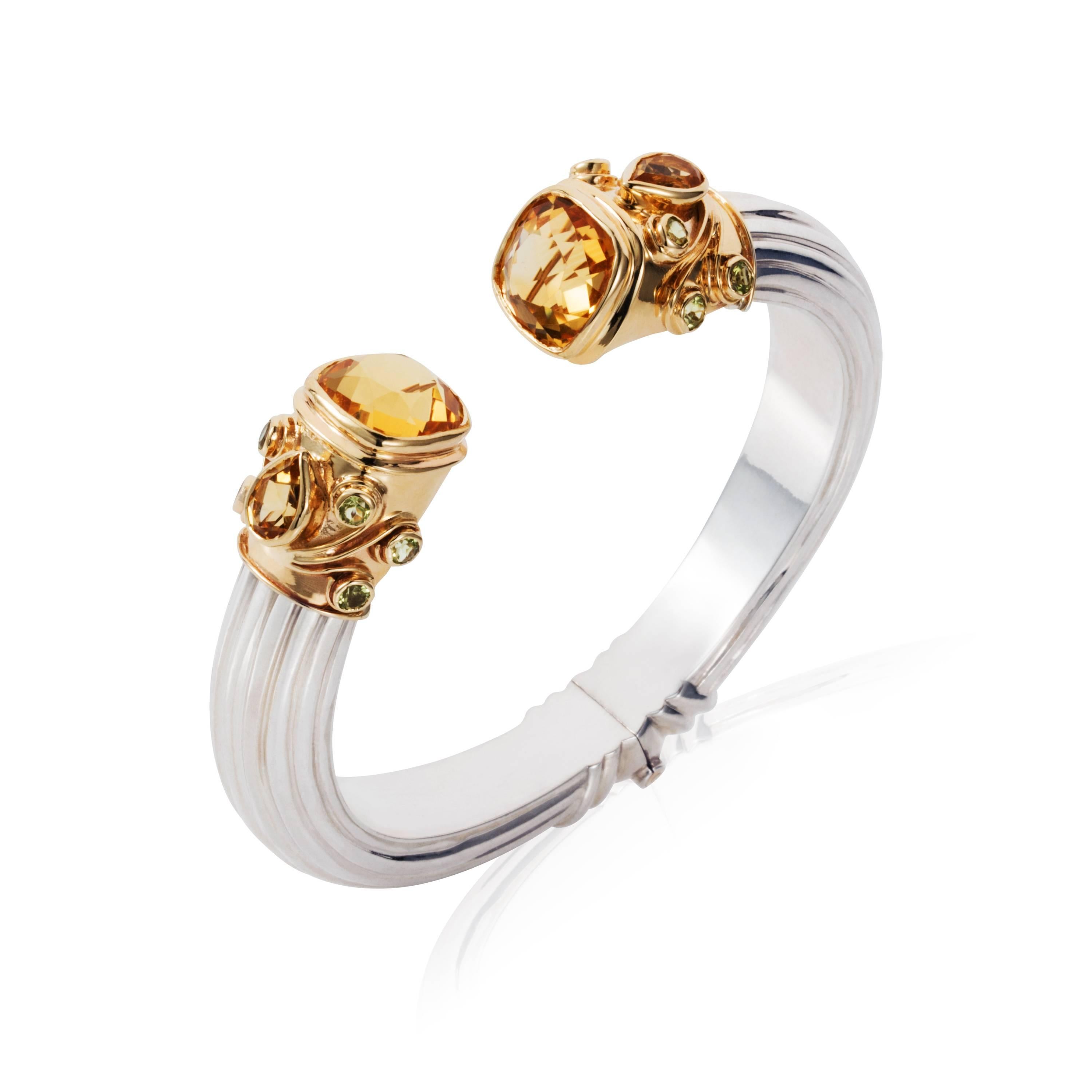 Blue Topaz Cuff bangle detail:
Gross weight: 63.340 grams 
Gold weight: 8.800 grams 
Total stone weight: 17.65 carats 
Measurements: 48mm by 60mm.  Different sizes available.

Citrine Cuff bangle detail:
Gross weight: 63.600 grams 
Gold weight: