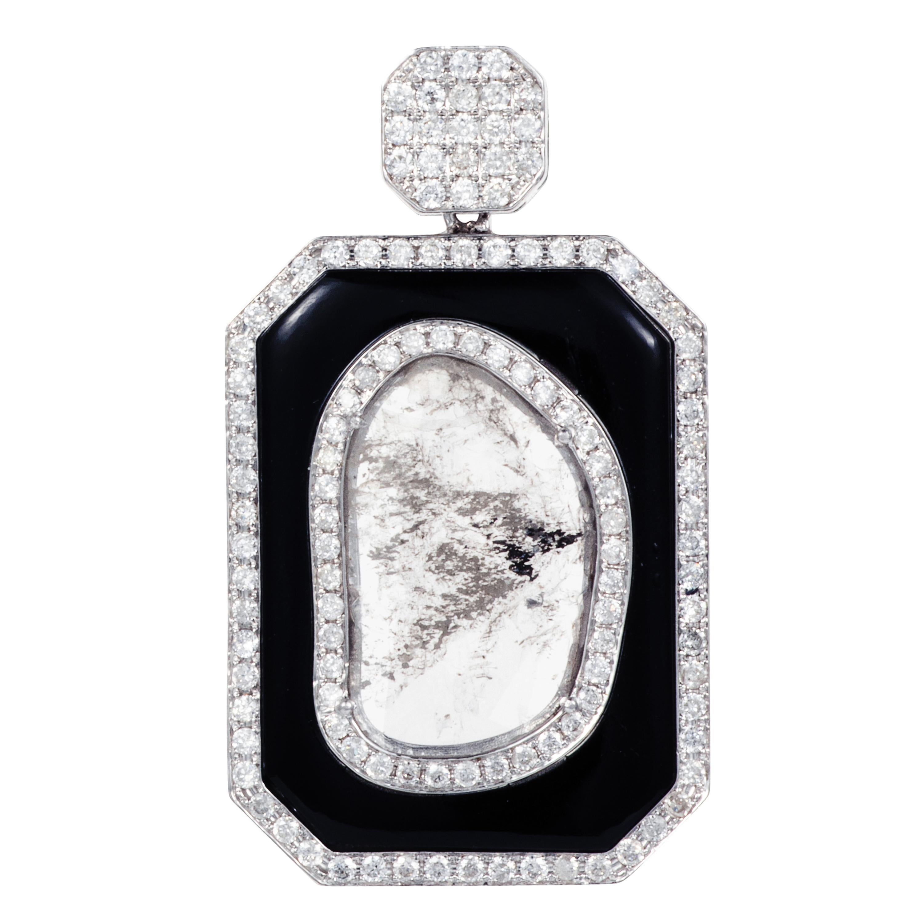 Gross weight: 10.76 grams
Gold weight: 8.50 grams
Diamond weight: 4.13 carat

Two slice diamonds encased in black onyx create a pair of striking earrings with design inspired by the Art Deco period.  Manpriya B is renowned for her work with slice