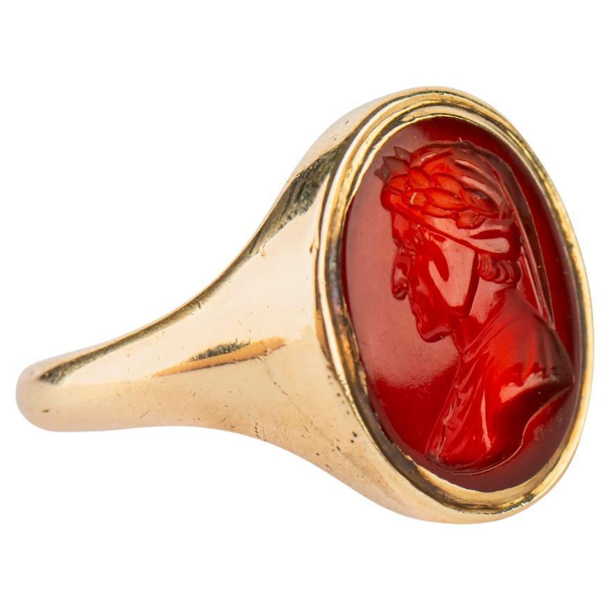 Beautiful, crisply engraved Neoclassical carnelian intaglio, the oval carnelian measuring 15.5 x 12.3 mm, the seal engraved with the profile of Dante Alighieri (1265-1321), and signed with the initials of gemstone carver Alessandro Merli (active