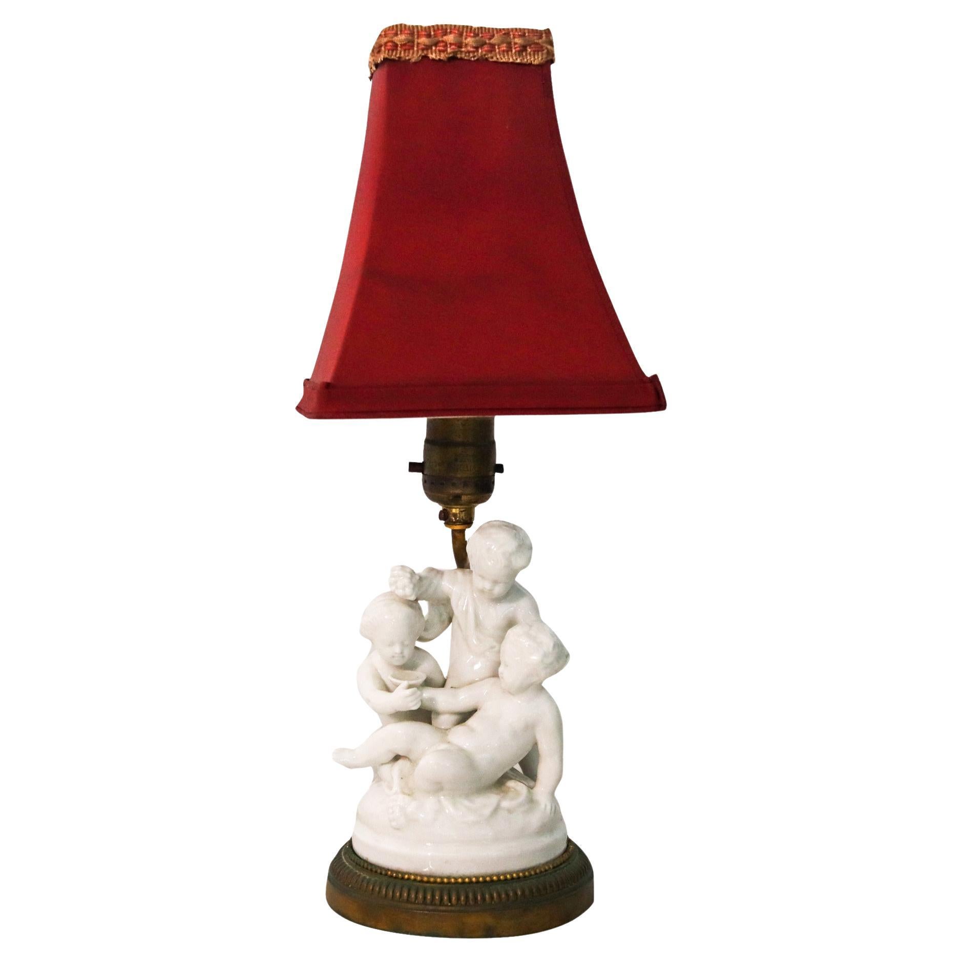Mansard Paris France 1880 Bronze Ormolu Lamp with Three Cherubins in Porcelain For Sale