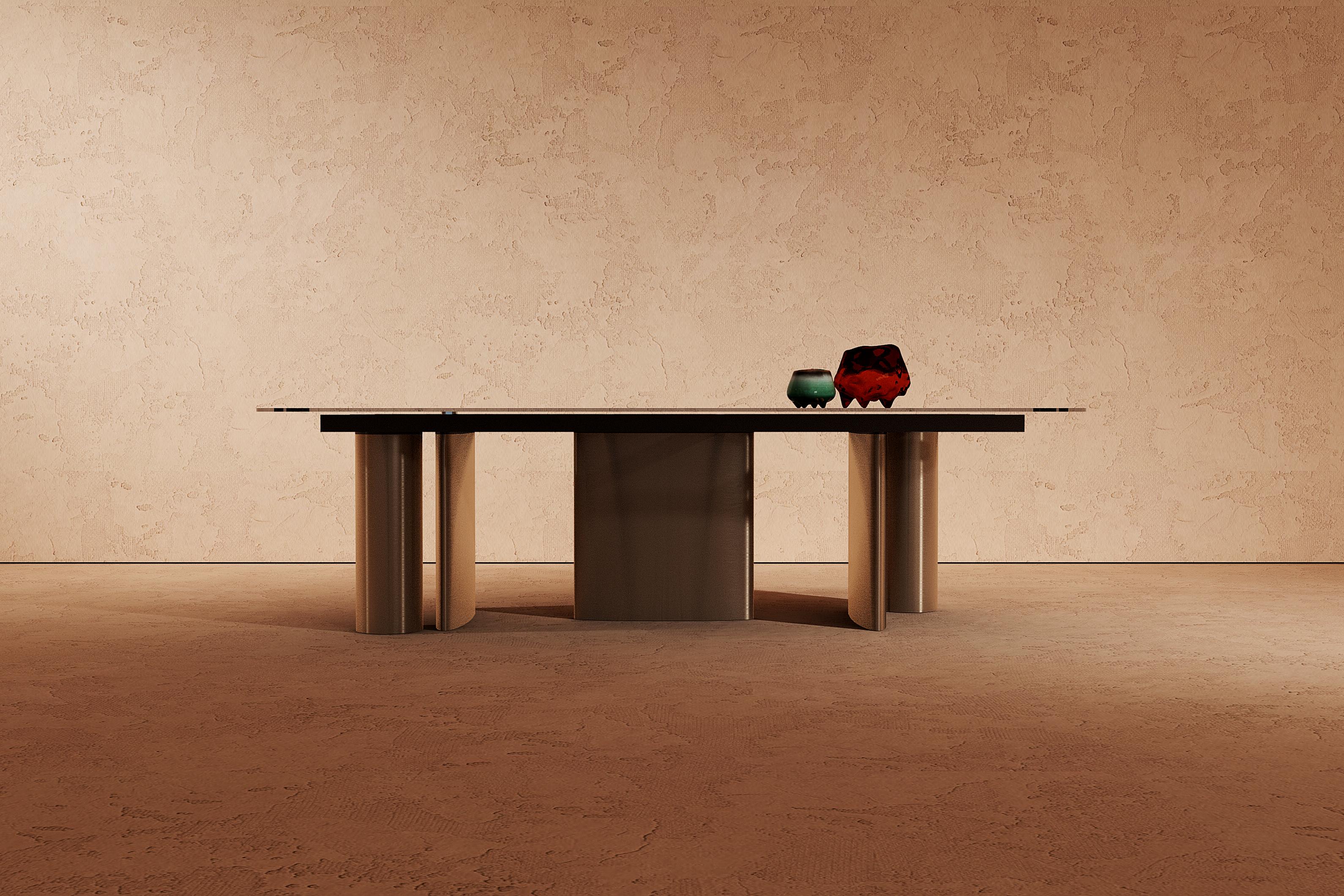 Modern Manson dining table with matte brushed bronze metal legs glass top For Sale