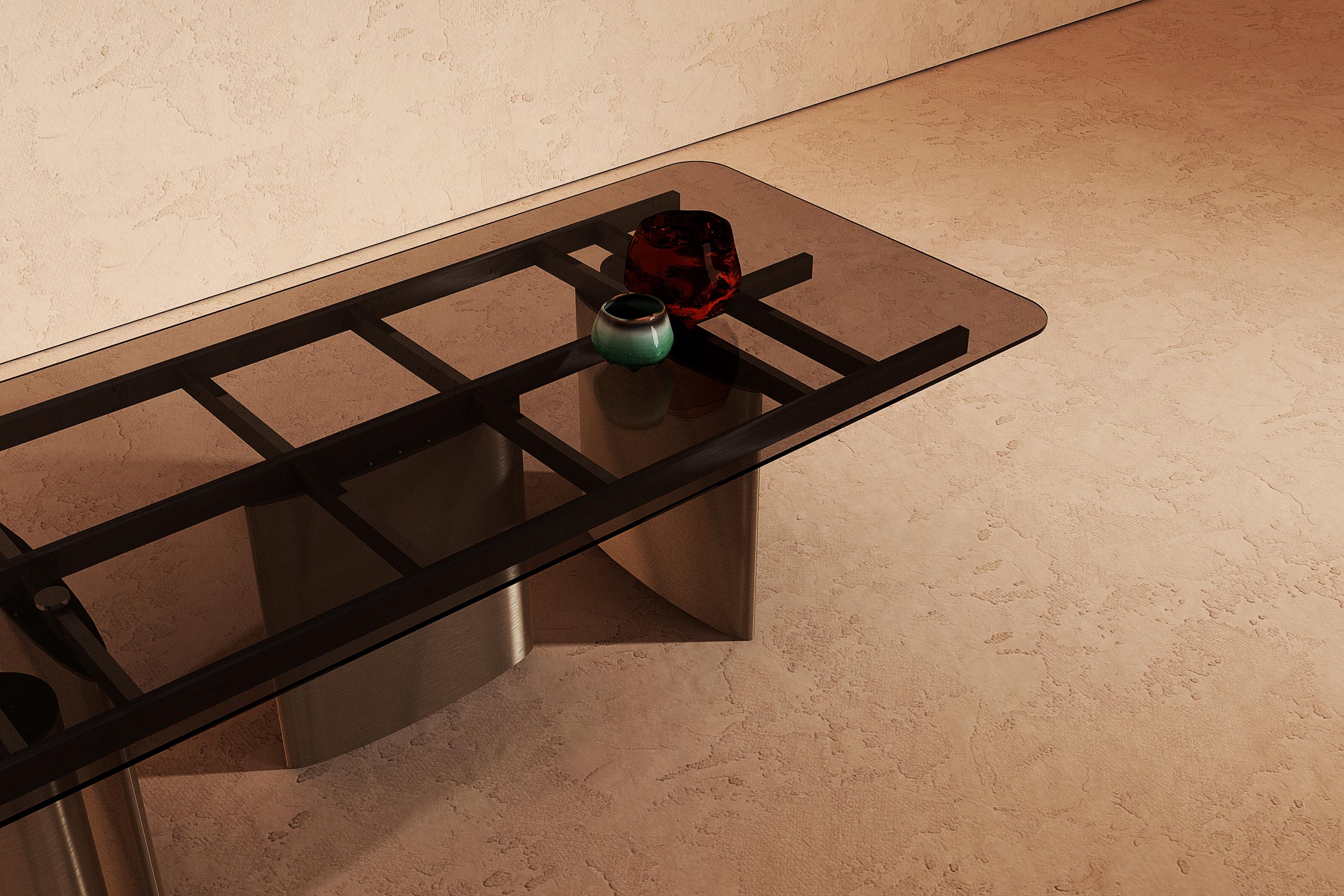 Hand-Crafted Manson dining table with matte brushed bronze metal legs glass top For Sale