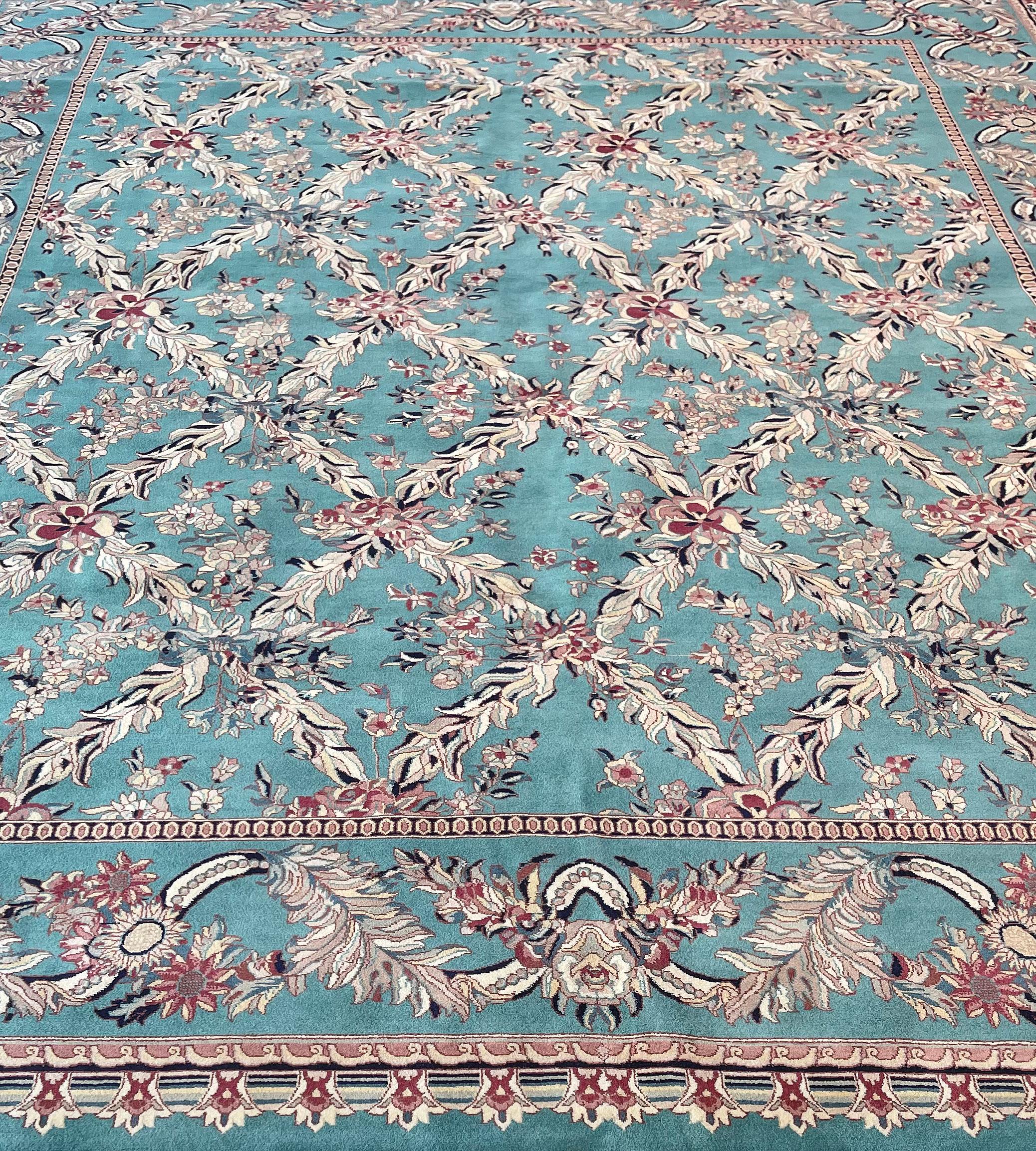 Genuine handwoven Tabriz rug from Pakistan. This exceptionally high quality rug features a superb master weave and a beautiful color combination. 100% Fine natural wool pile on cotton foundation.