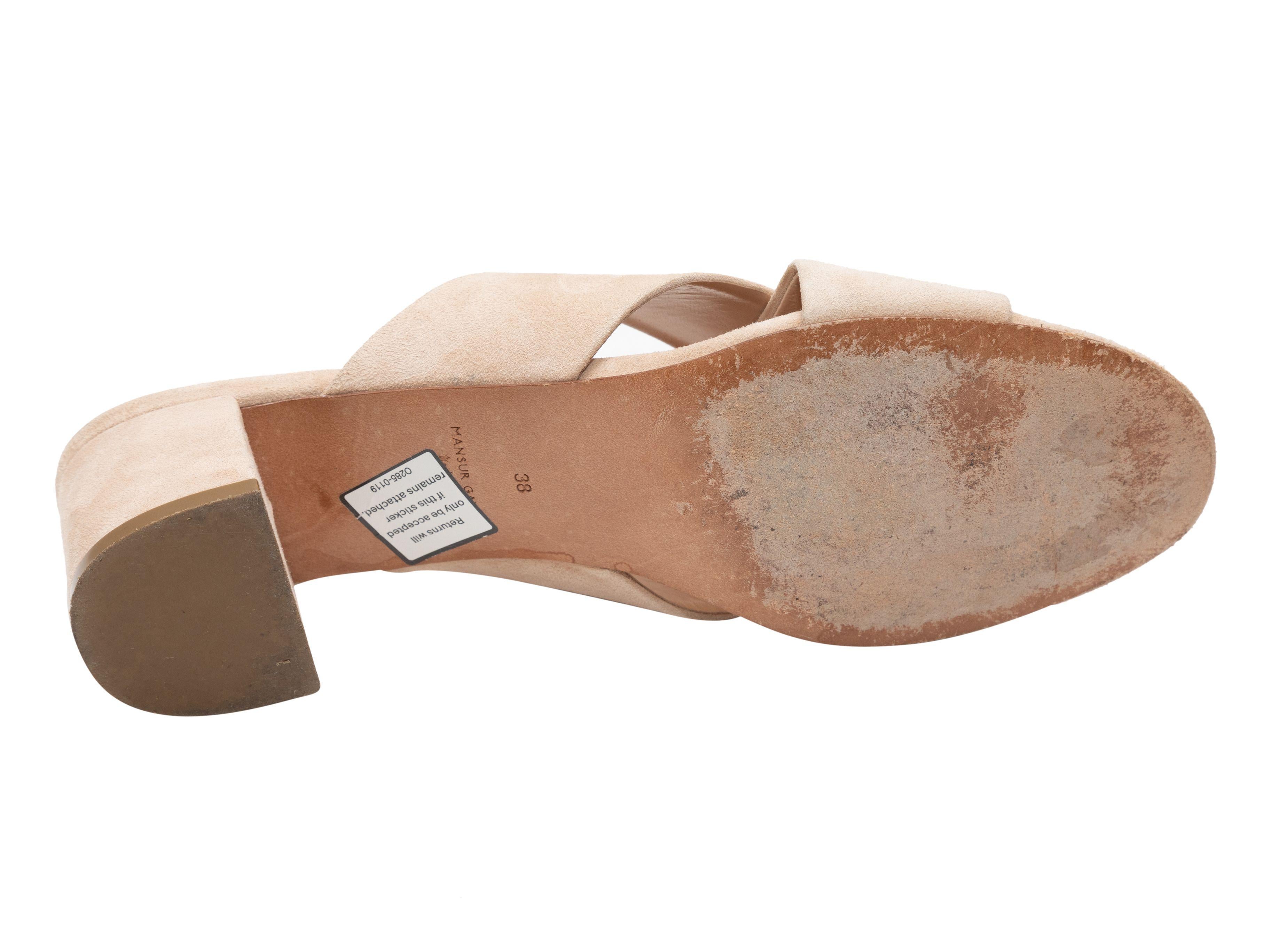 Product Details: Beige suede heeled slide sandals by Mansur Gavriel. 2