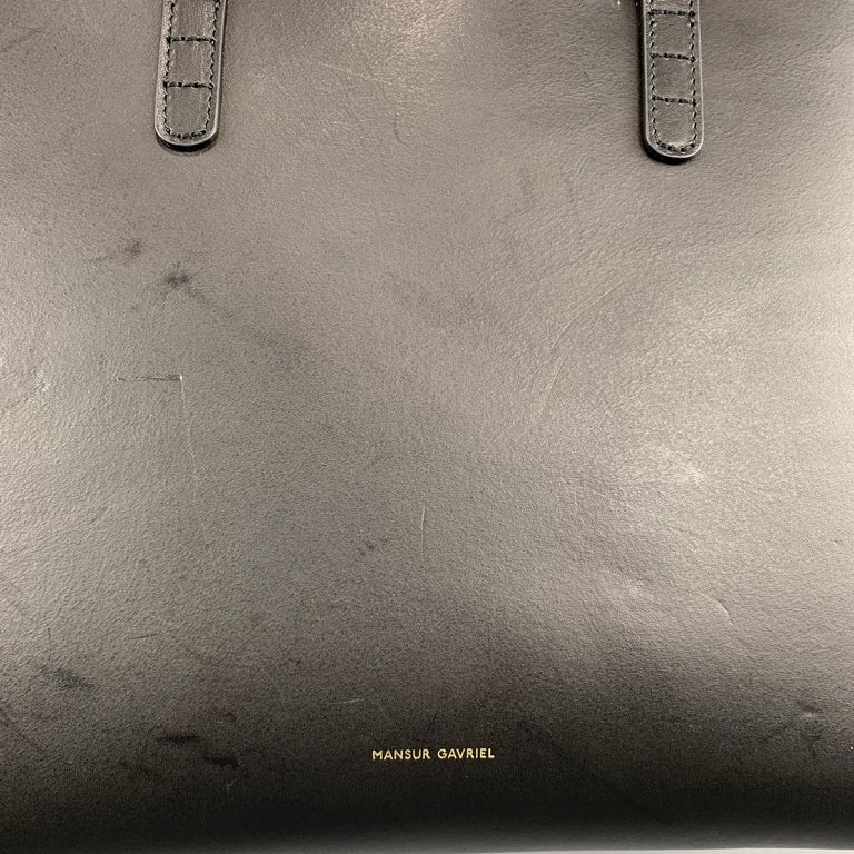 black bag with red inside