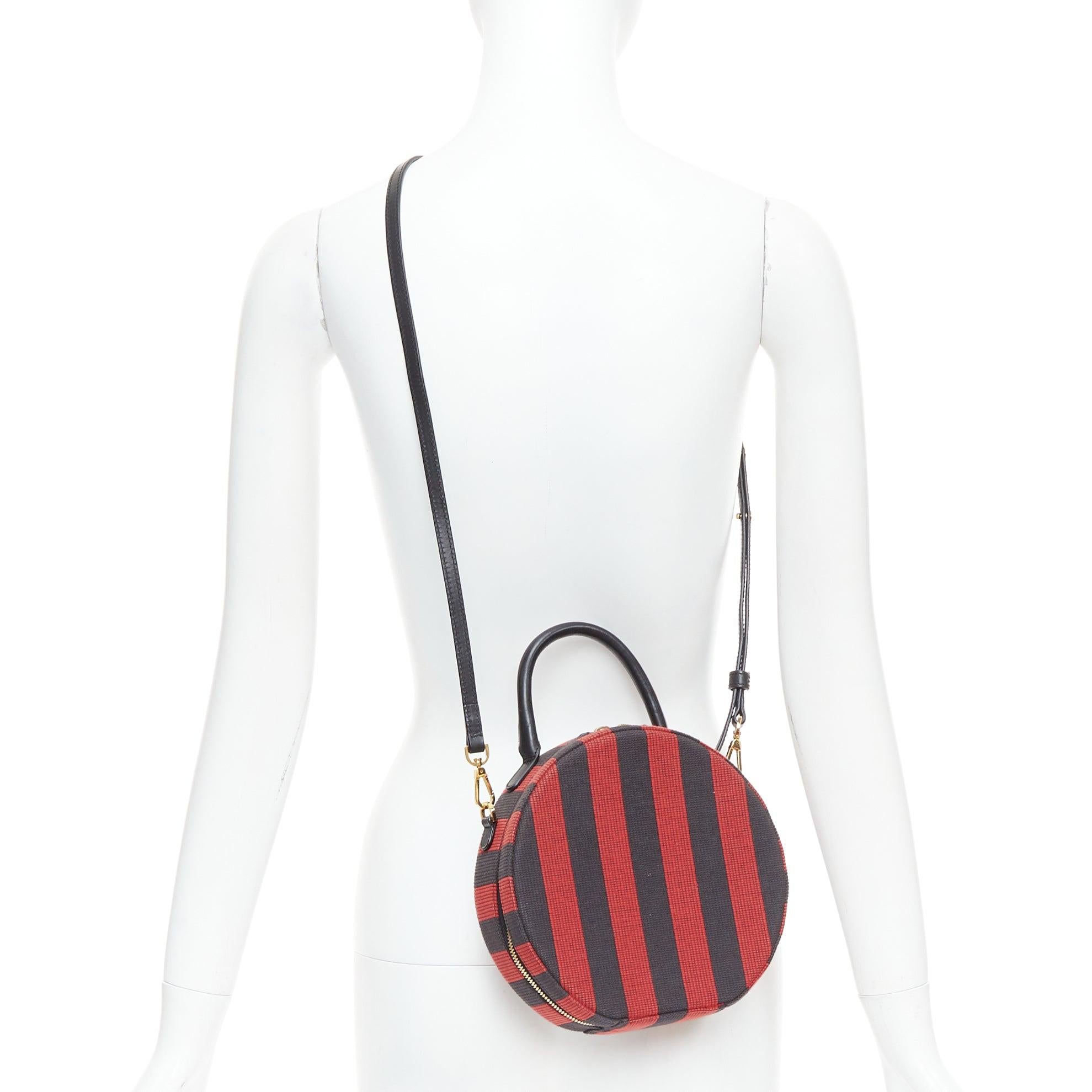 MANSUR GAVRIEL Circle black red striped fabric leather trim crossbody bag
Reference: WECN/A00070
Brand: Mansur Gavriel
Model: Circle
Material: Fabric, Leather
Color: Red, Black
Pattern: Striped
Closure: Zip
Lining: Cream Canvas
Made in: