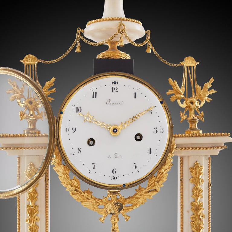 Bronze Mantel Clock 18th Century Louis XVI Period by Arnoux À Paris For Sale