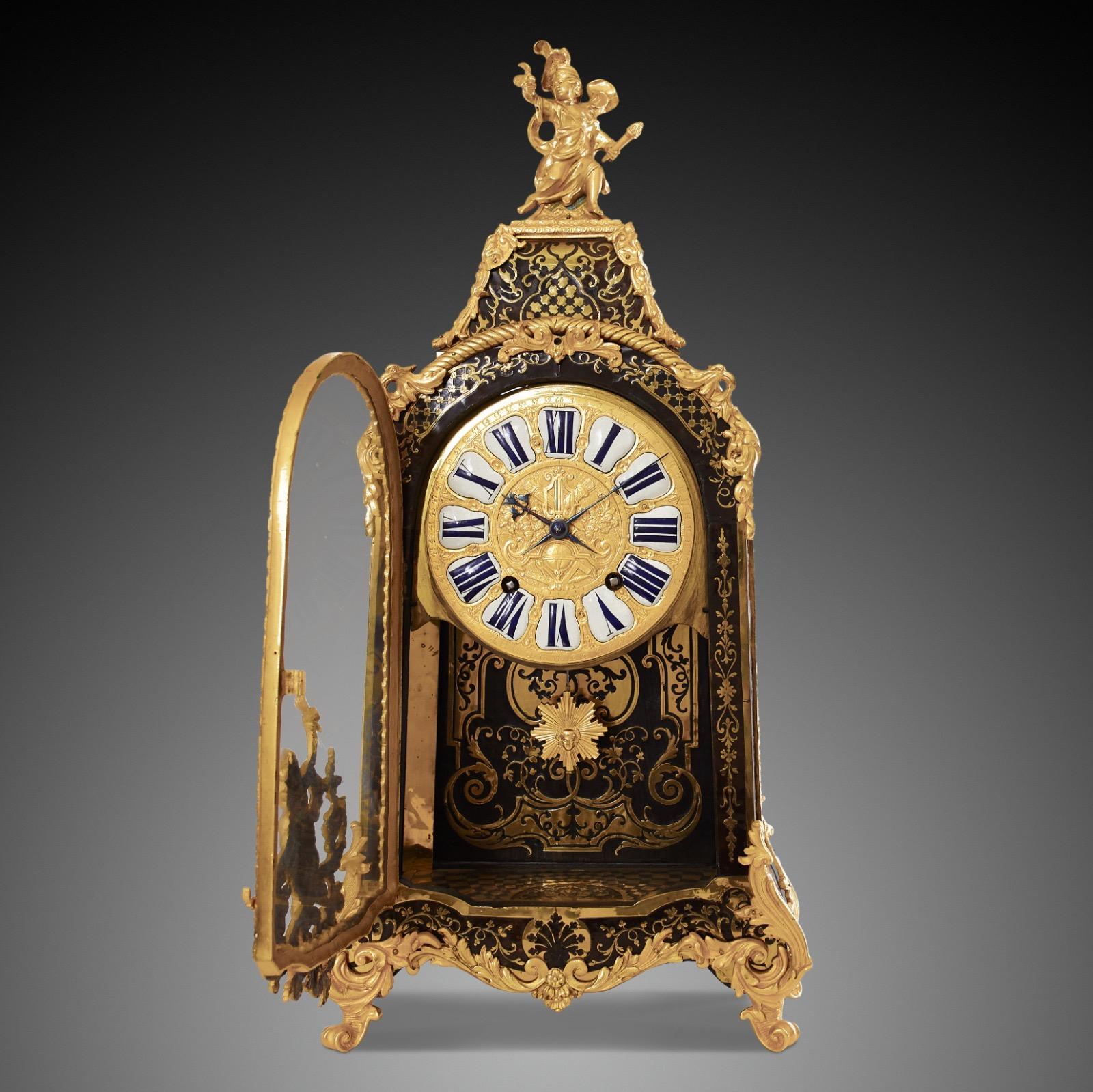 Mantel clock 18th Century styl Boulle by JOSUE PANIER À PARIS.