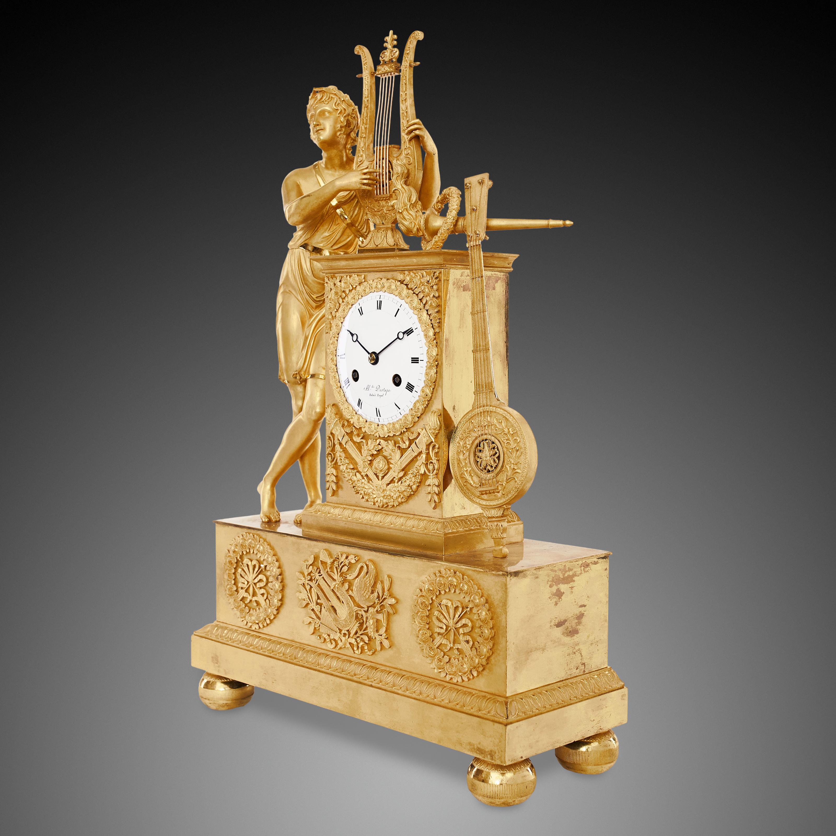 Figural mantel clock signed “Al. dre Destape Palais Royal”
The bronze figural mantel clock depicting one of the mythical heroes - Orpheus originates from the Empire period. The clock is made in a characteristic Empire style, a major phase of