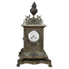 Pendule de cheminée:: 19ème siècle français Louis XVI en bronze