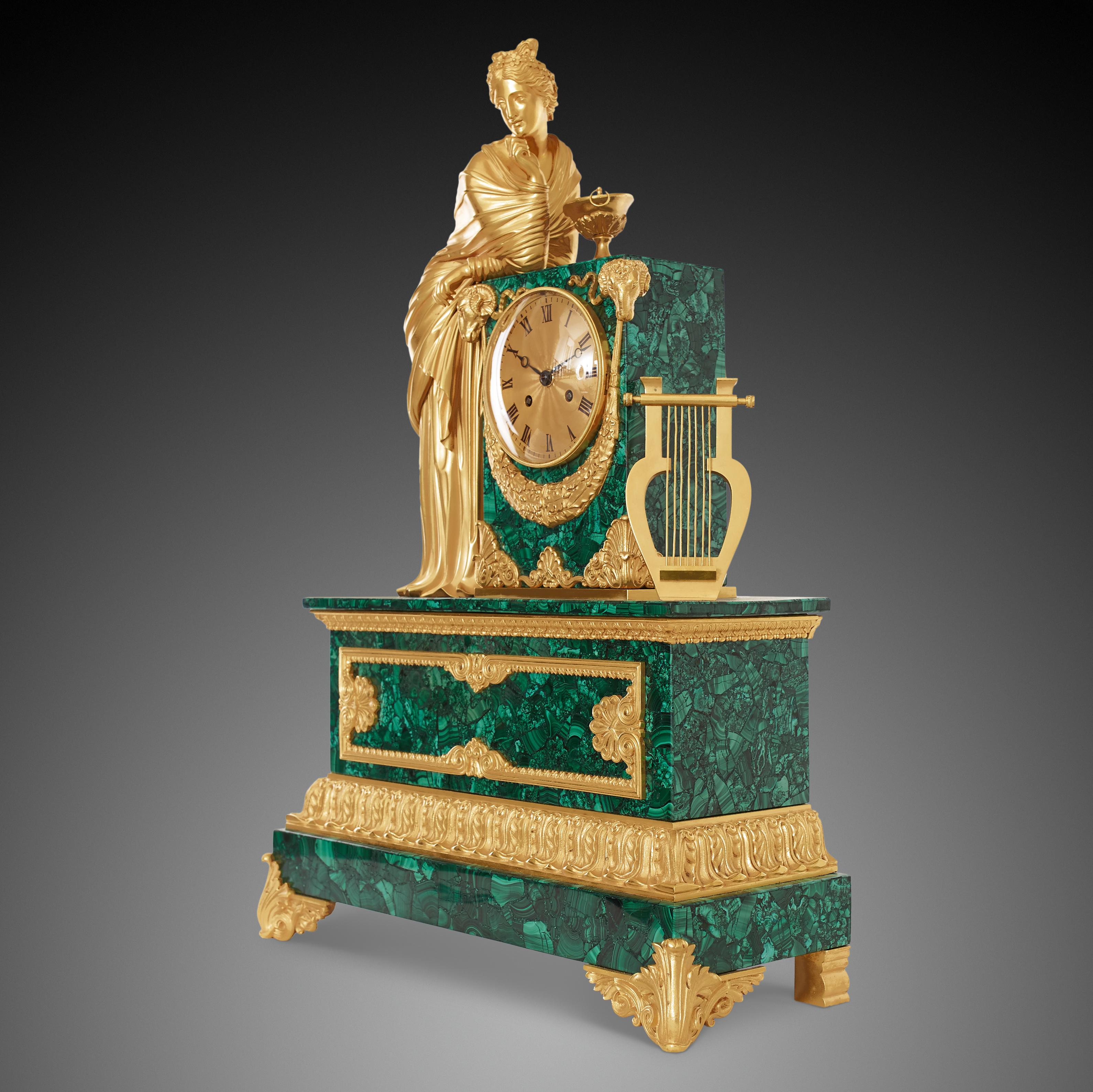 Fine Louis Phillippe, circa 1830-1850, French gilt bronze allegorical mantel clock. Circular dial with Roman numerals mounted within an embossed gilt bezel. Silk suspension eight-day movement striking a bell enclosed in a rectangular case. Allegory