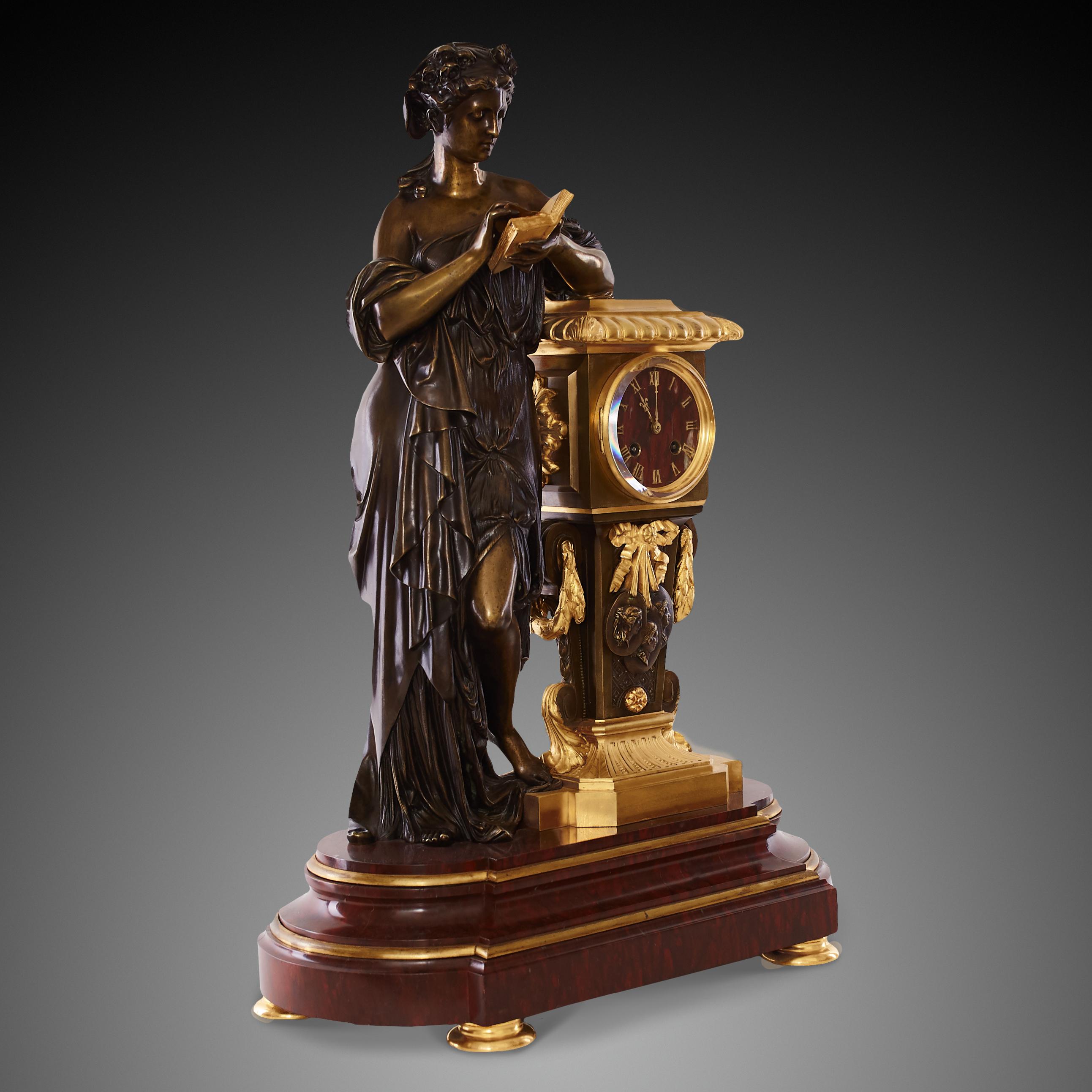 Beautifully decorated clock in the color of walnut with a figure of a woman reading a book, all set on brown marble
Details of the movement mechanism: Eight days there is a pendulum hanging. He struck an hour and a half on the bell. The clock is