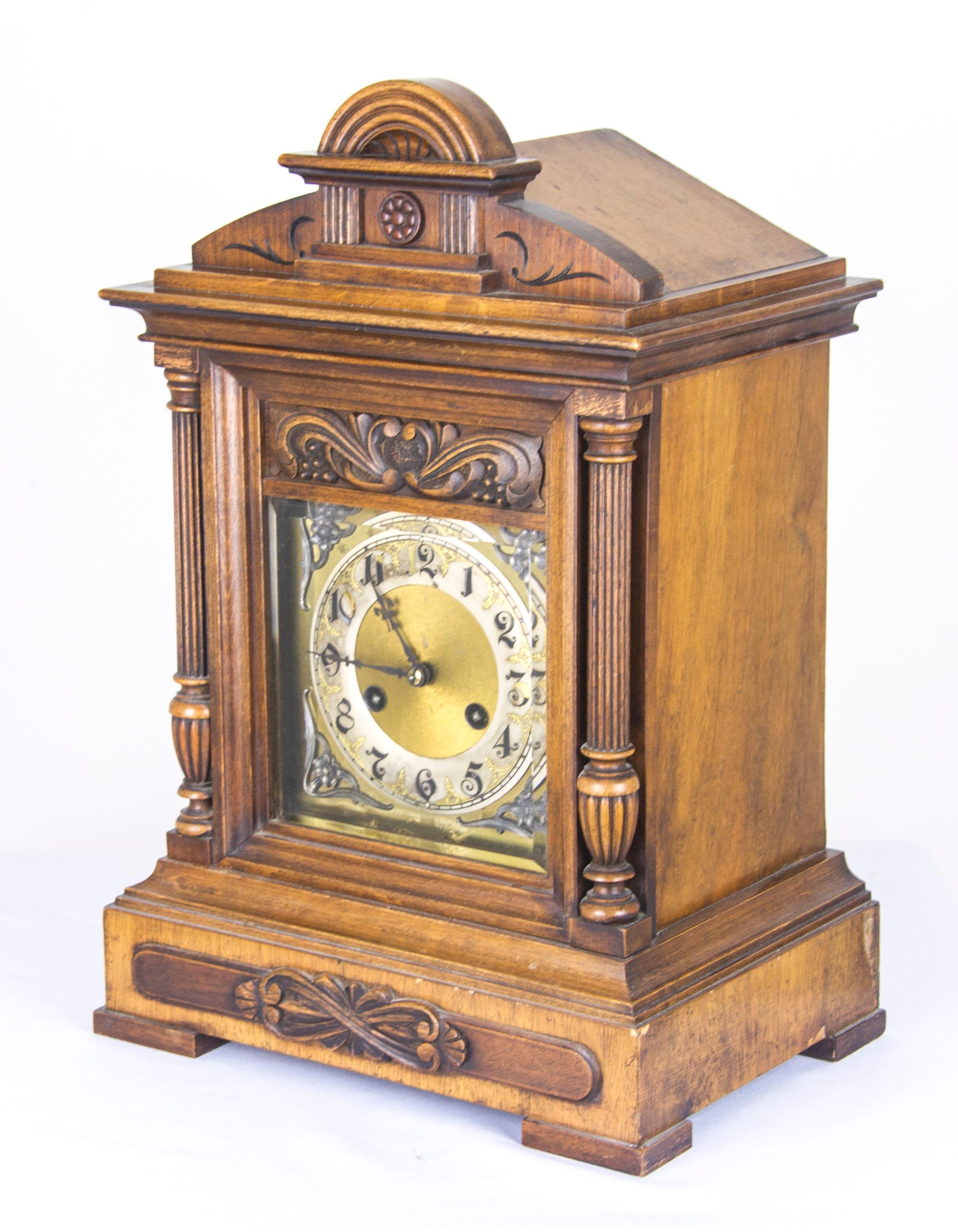Antique mantel clock, bracket clock, walnut cased, German 1900, antique furniture, H491

8 day movement striking on the hour and each quarter hour
Face has an etched silver chapter ring with gilded spandrels
Black Arabic numerals
Ormolu