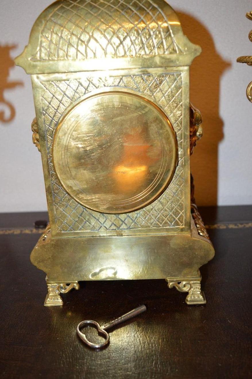 Mantel Clock in Gilded Bronze For Sale 4
