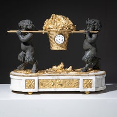 Kaminuhr mit kleinen Satyrn, 1. Hälfte des 19. Jahrhunderts