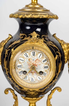 Mantel Set with a Clock and Two Candelabras, 19th Century, Napoleon III Period.