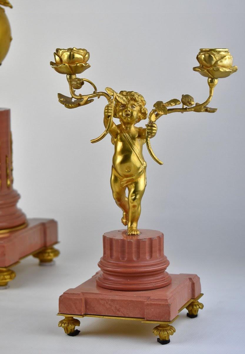 Juego de repisa con reloj y dos candelabros, S. XIX. Dorado en venta