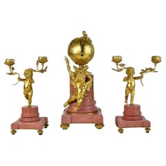 Mantel Set with Clock and Two Candelabras, 19th Century.