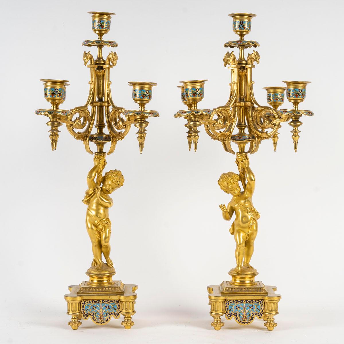 Mantelpiece and candelabras in gilt and cloisonné bronze, 19th century, Napoleon III period.

Clock, mantelpiece and candelabra in gilt and cloisonné bronze, beautiful gilding and chasing of the bronze, 19th century, Napoleon III period, clock